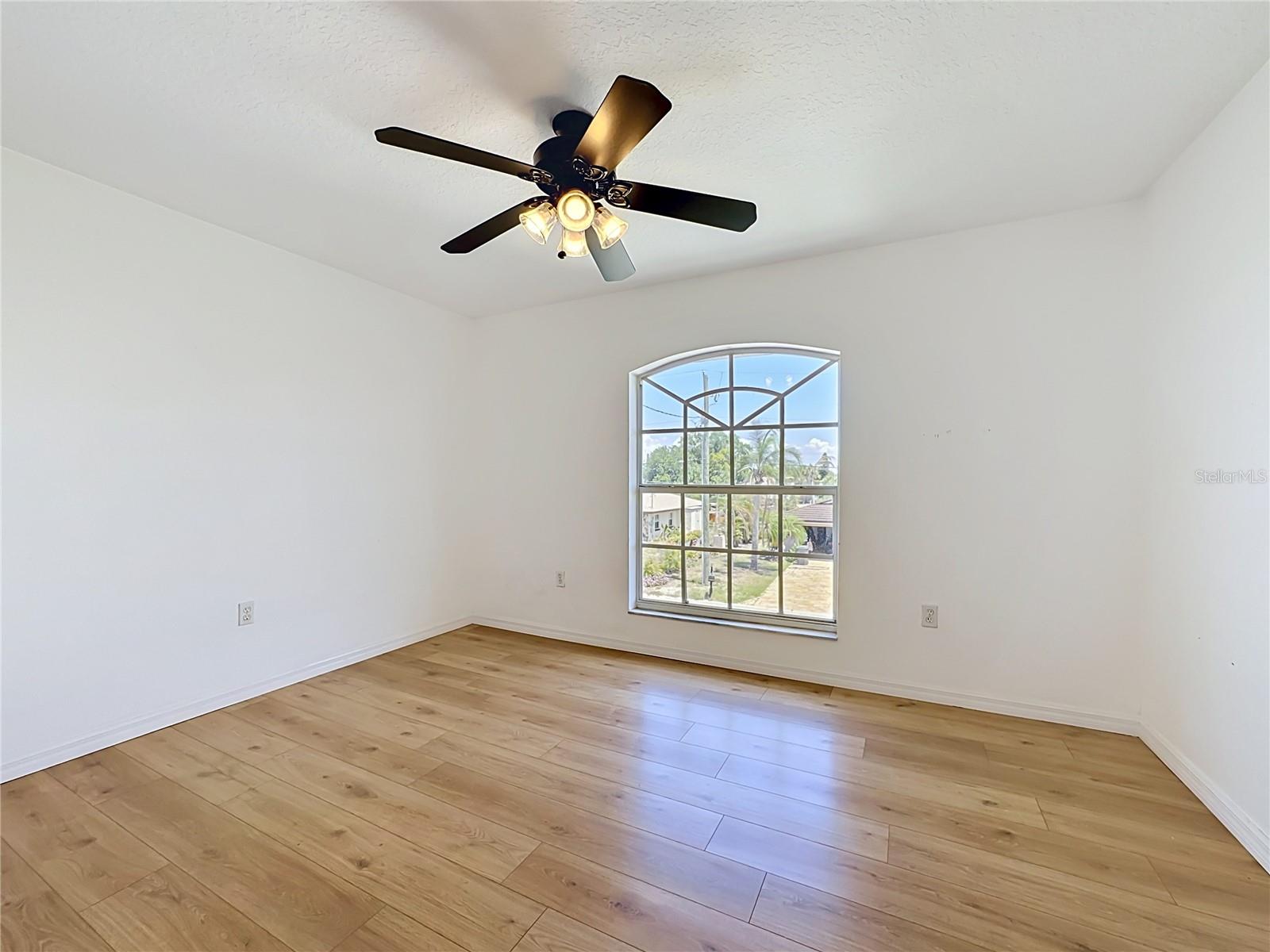 Versatile bedroom with abundant natural light