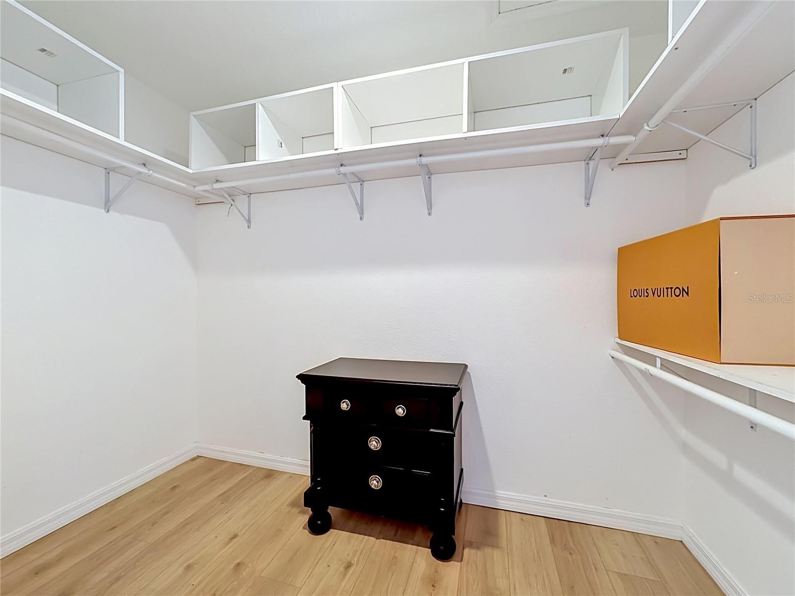 Walkin closet in the owenrs suite