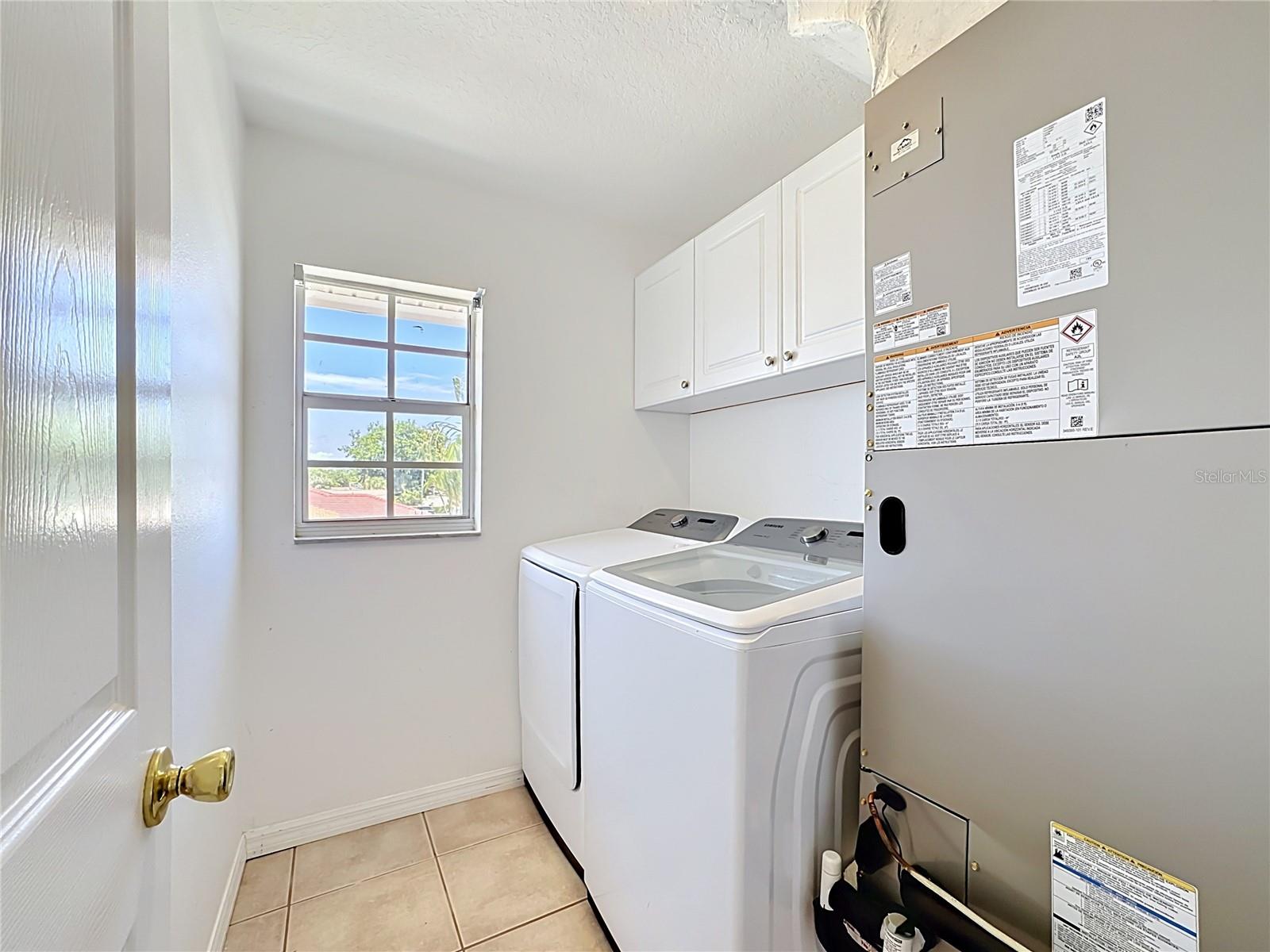 Upstairs laundry room with washer/dryer space