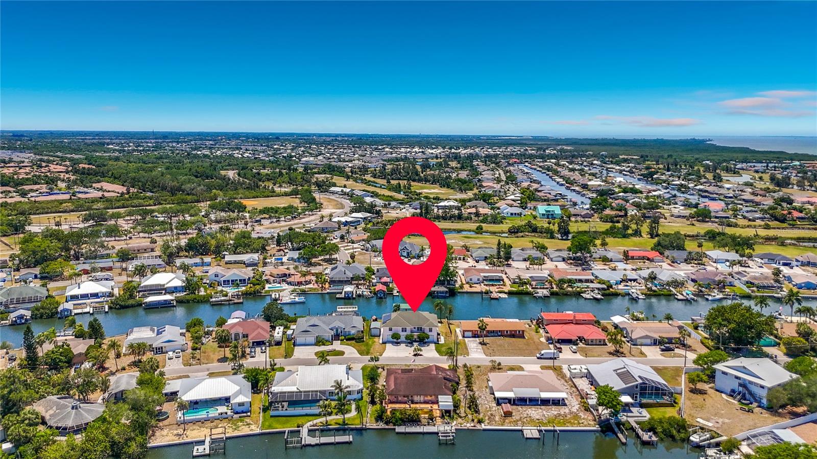 100 feet of waterfront on a deep water canal that stays wet