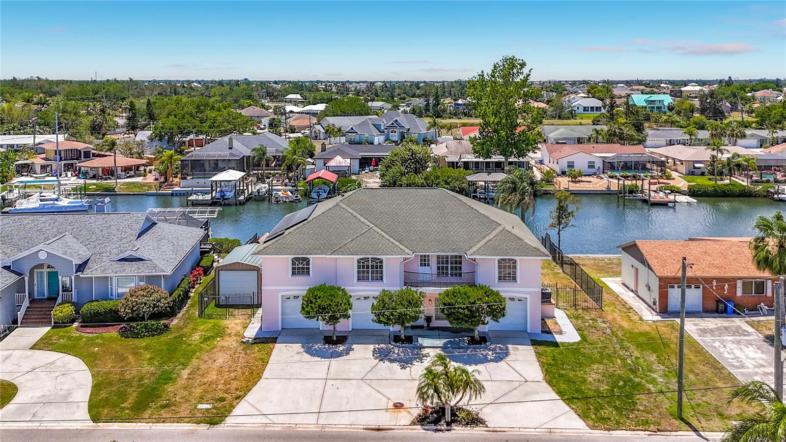 624 Kingston Ct from above — pool, dock, and waterfront