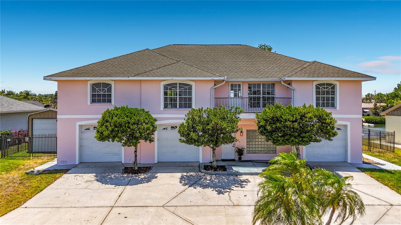 Apollo Beach waterfront pool home with 3-car garage