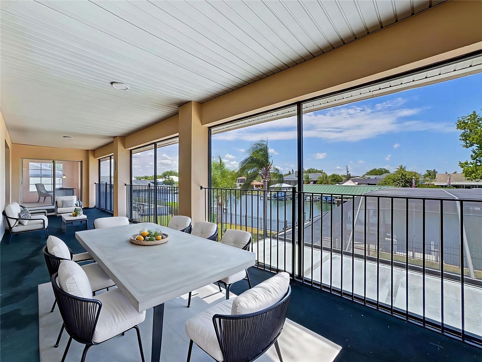 Dining area opens to 37-foot screened balcony