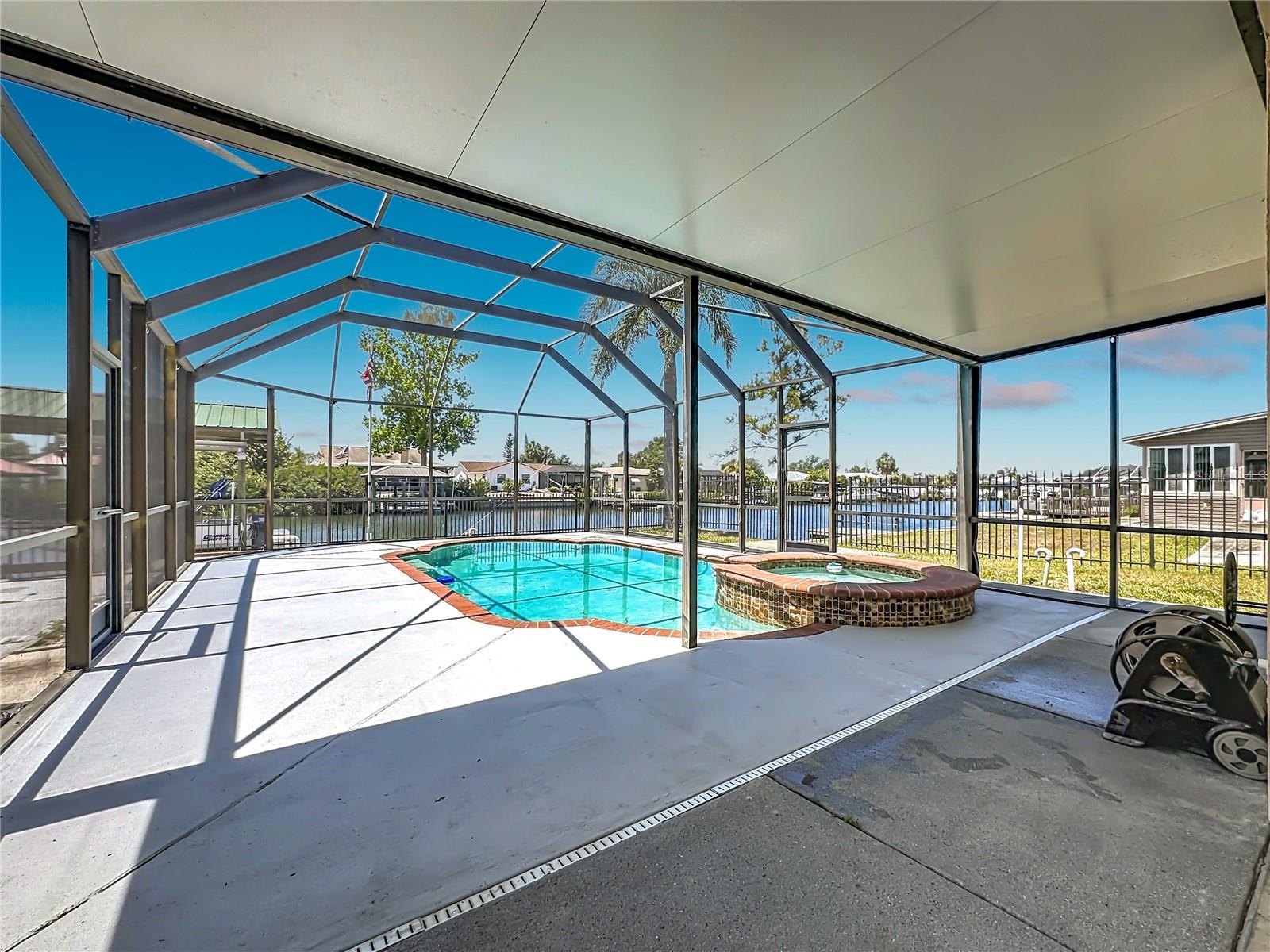 Screened pool with covered patio space