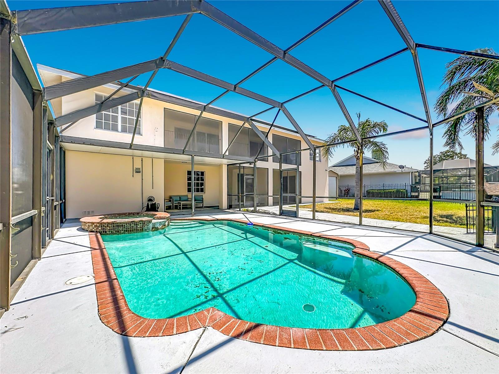 Screened pool and spa under the lanai