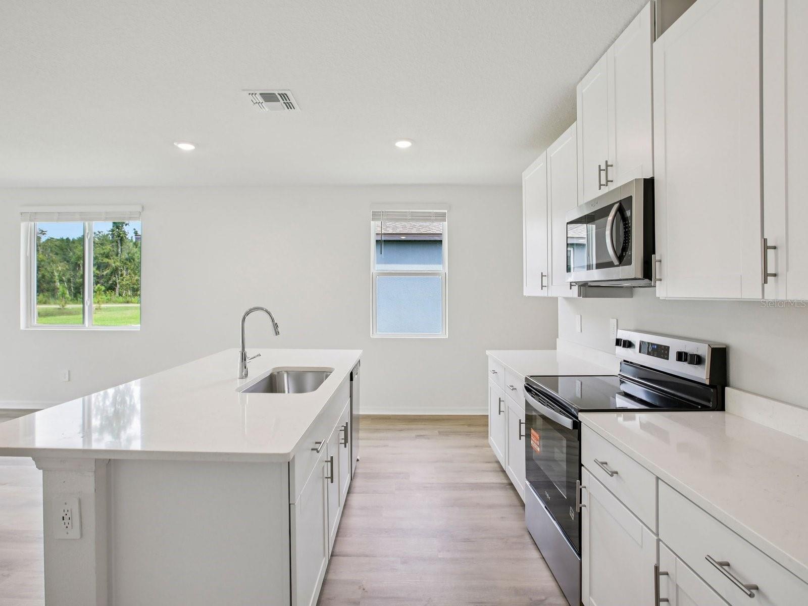 Interior photos are not of the actual home but are photos of the builder home with the same floorplan with similar interior finishes and features.