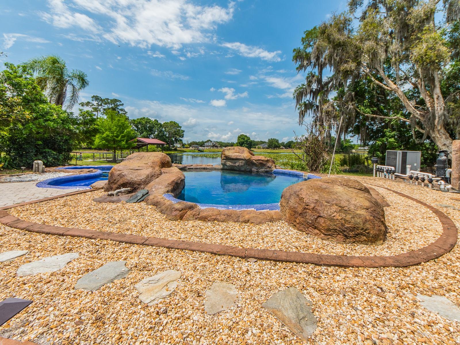 Resort-style pool with lake views
