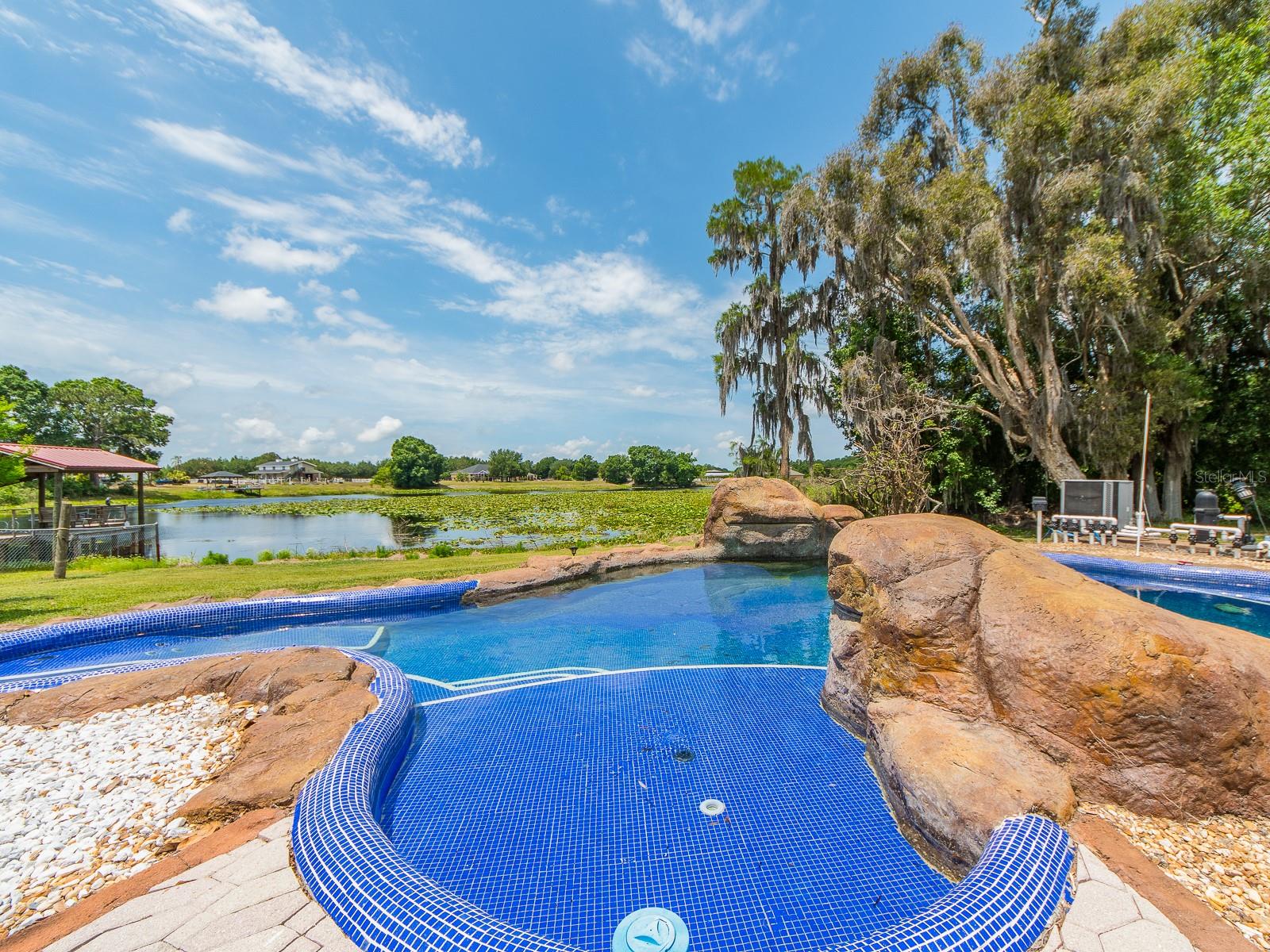 Resort-style pool with lake views