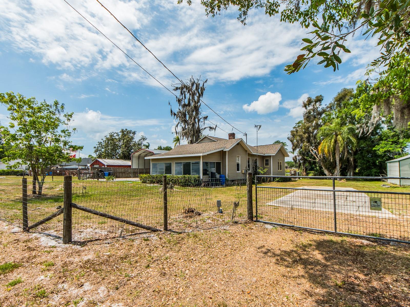 Gated entry and front portion of lot