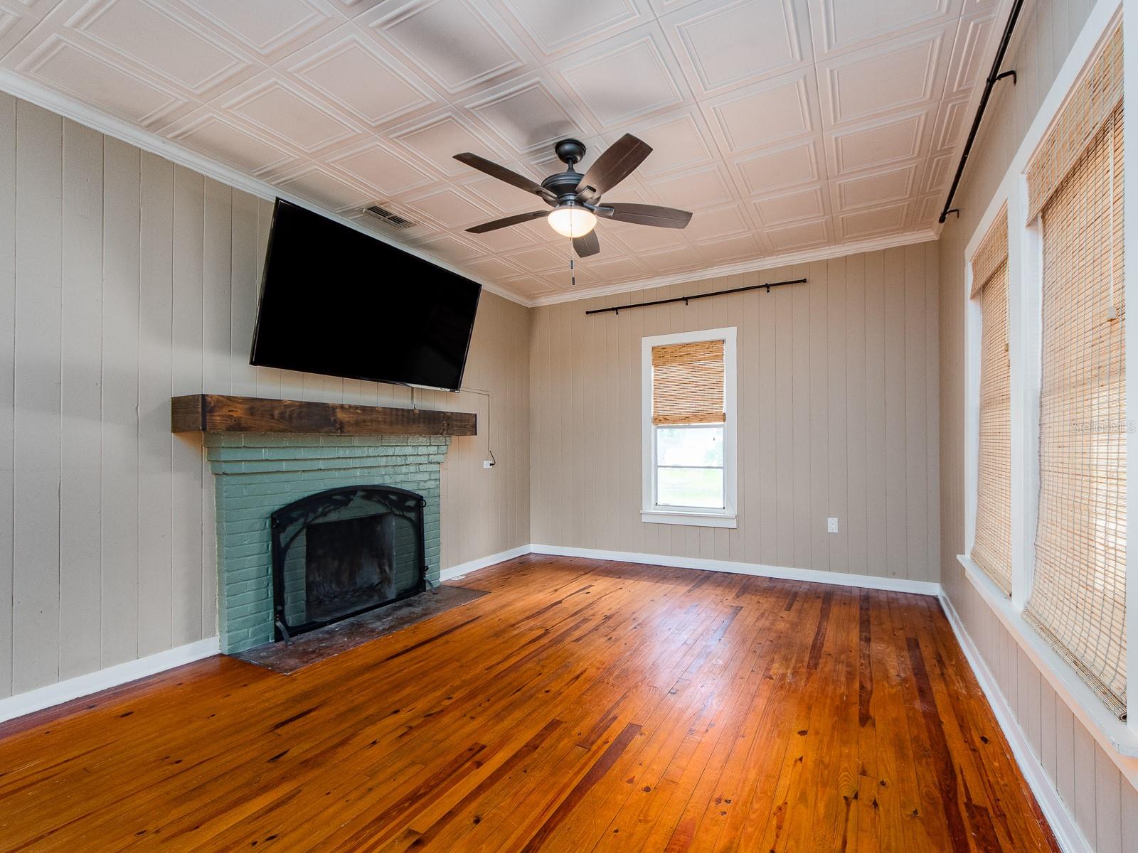 Living room with wood-burning fireplace