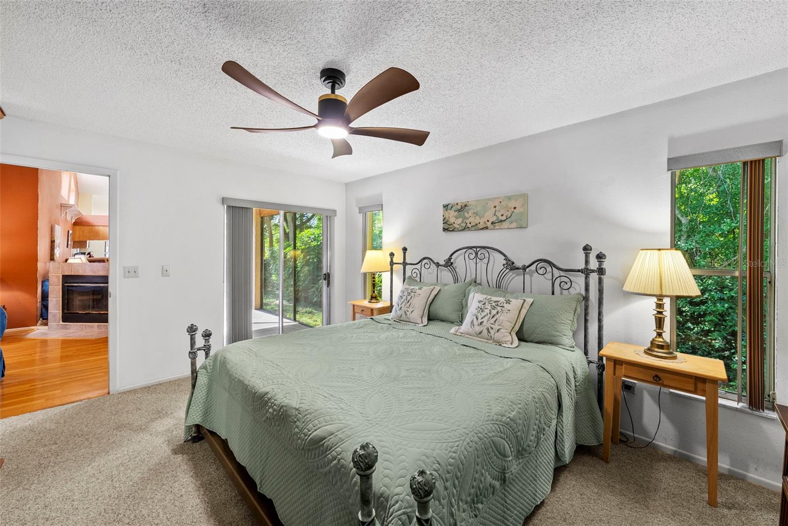 Primary bedroom with generous natural light and neutral finishes.