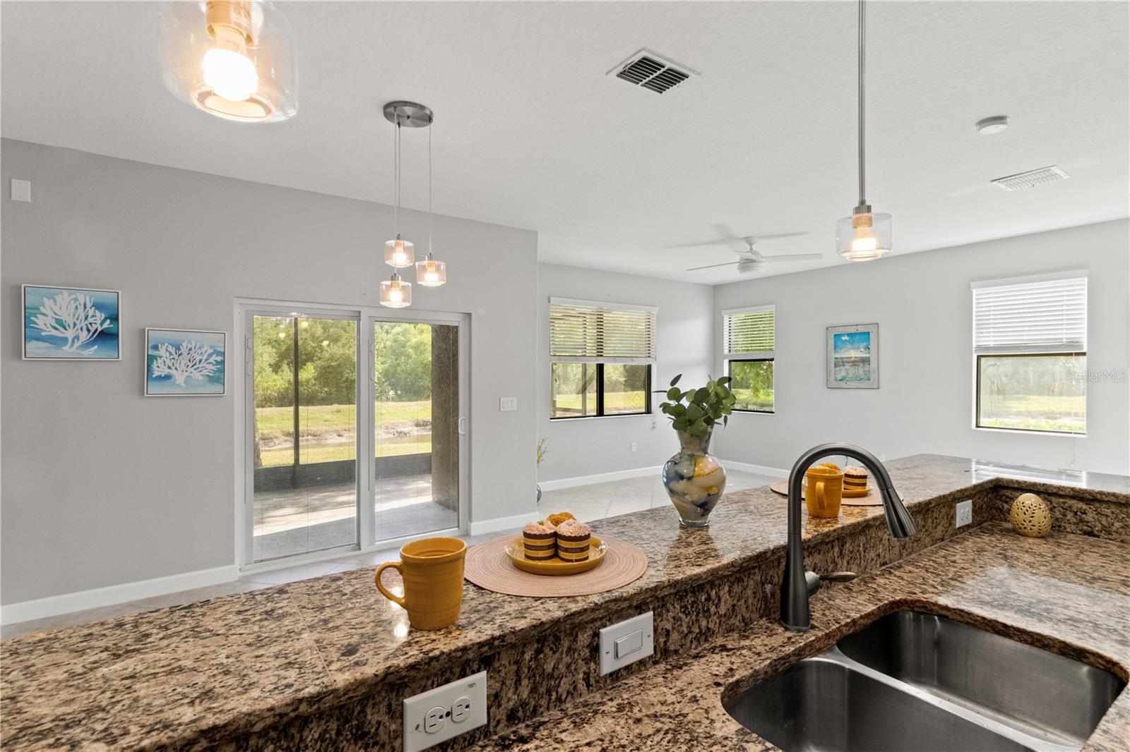Chat with your guests while working in this open floor plan