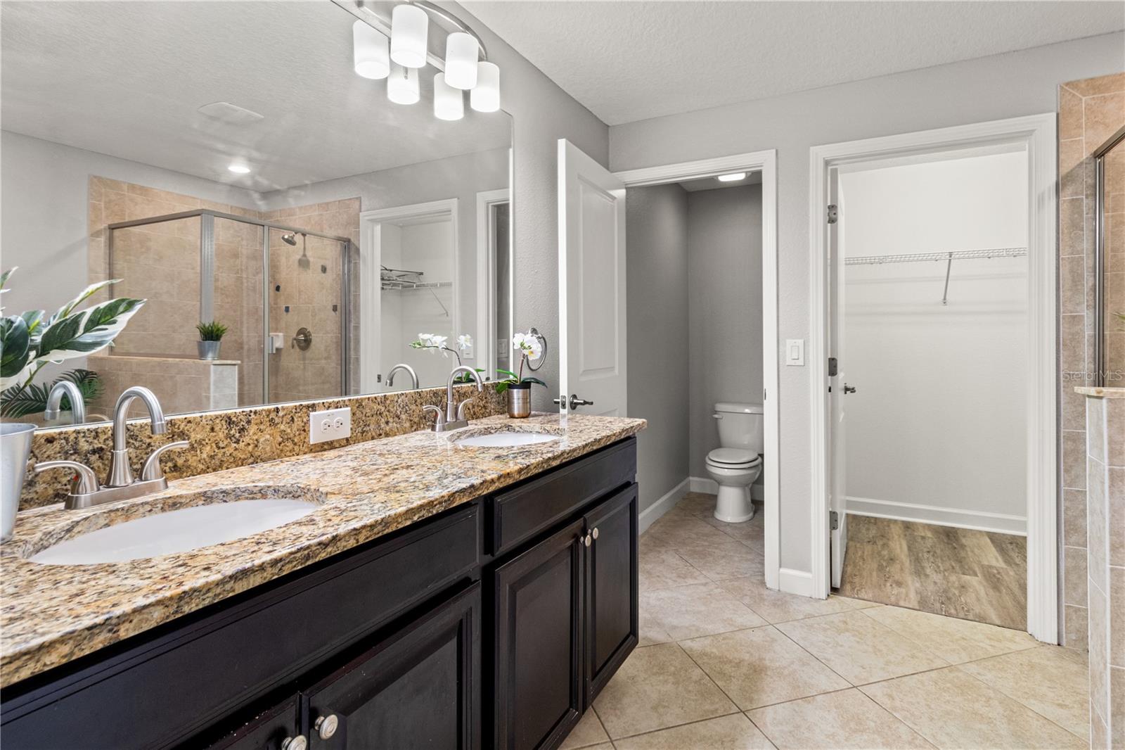Double vanities and a huge walk in closet