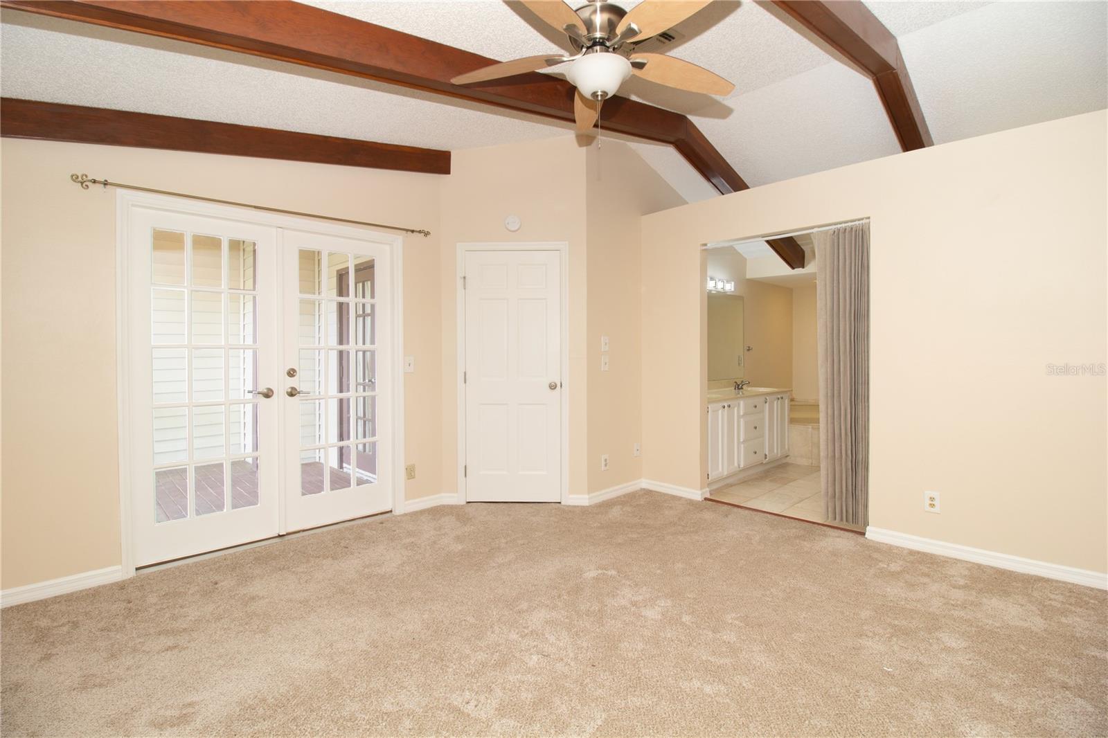Primary BR with access to Screened Porch