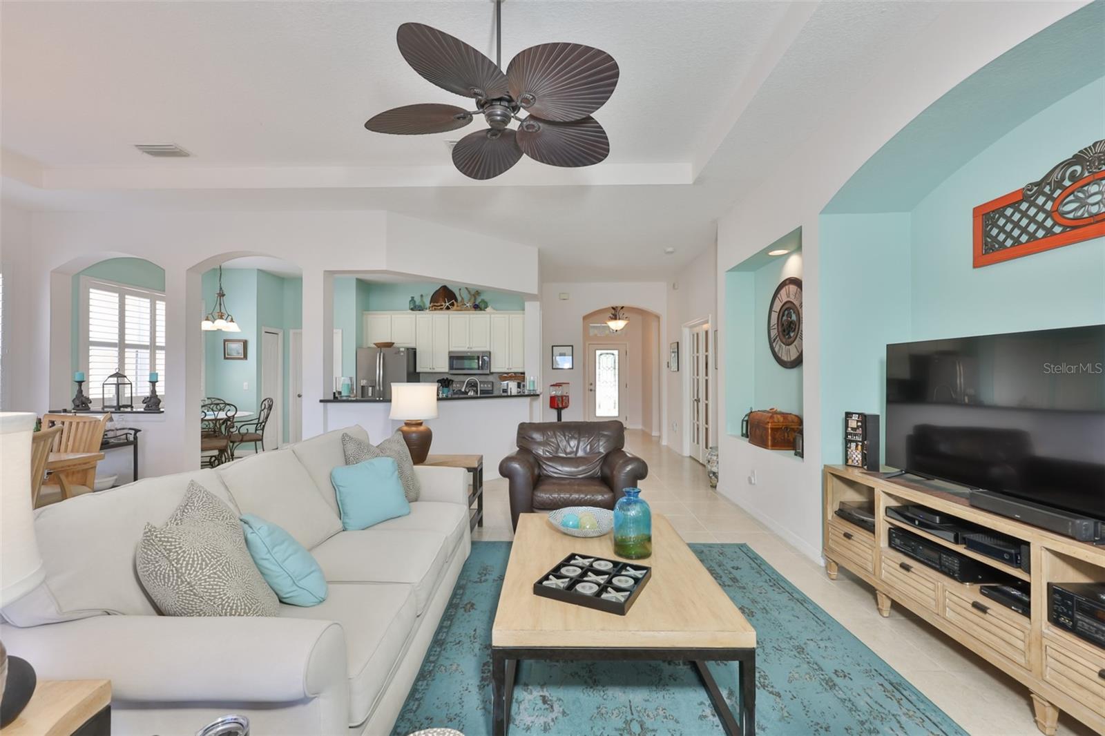 The architectural features in this home along with the coastal feel make this a relaxing and perfect Floridian home to own.