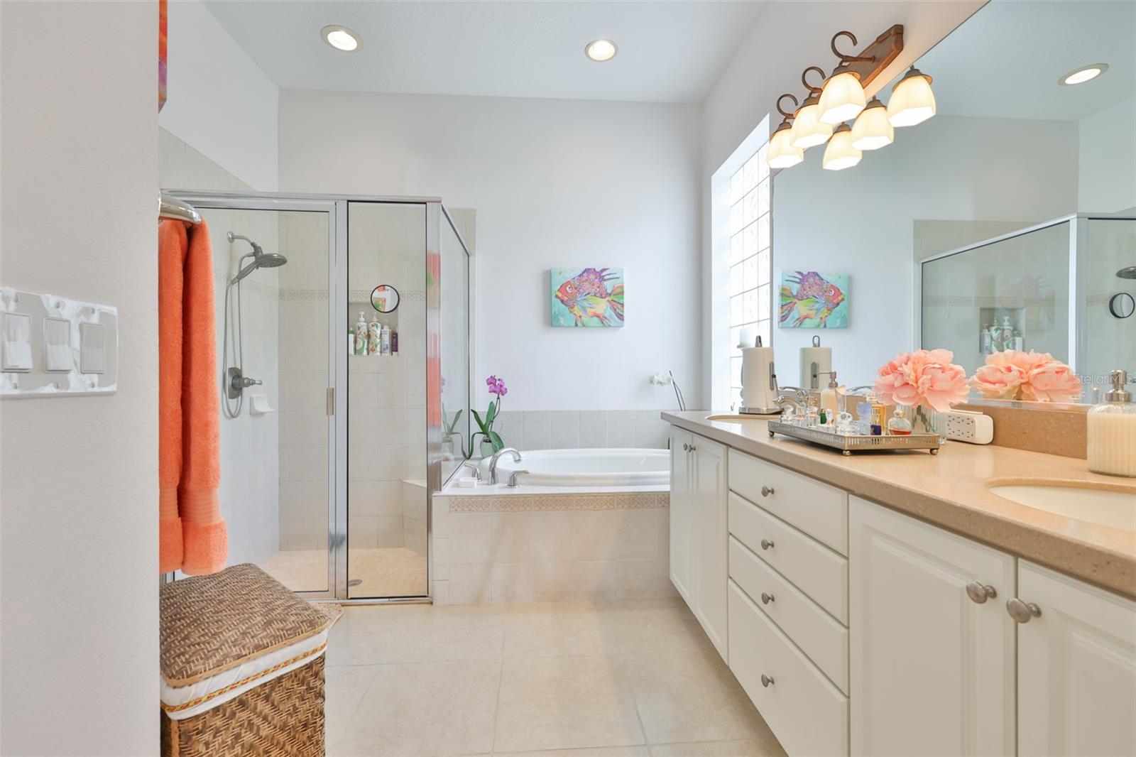 The bathroom boasts of a walk in closet, dual sinks, soaker tub, large shower and private water closet.