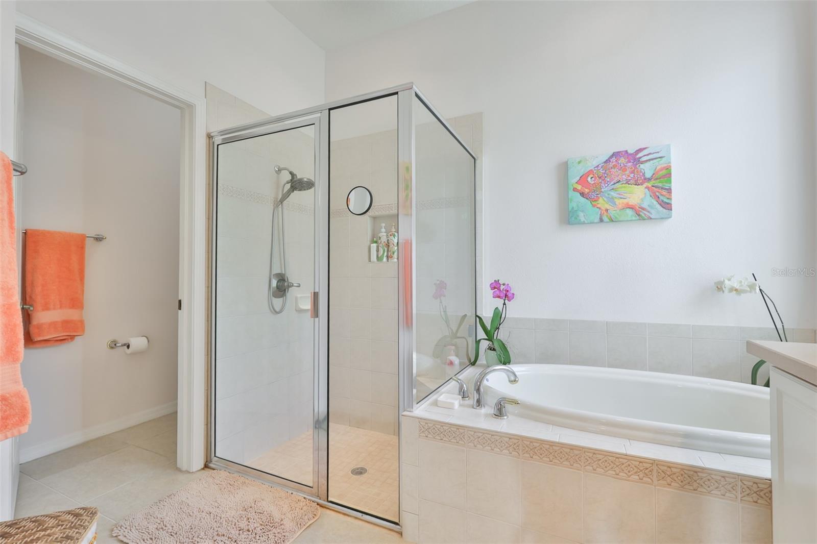 Private water closet, large shower and soaking tub.