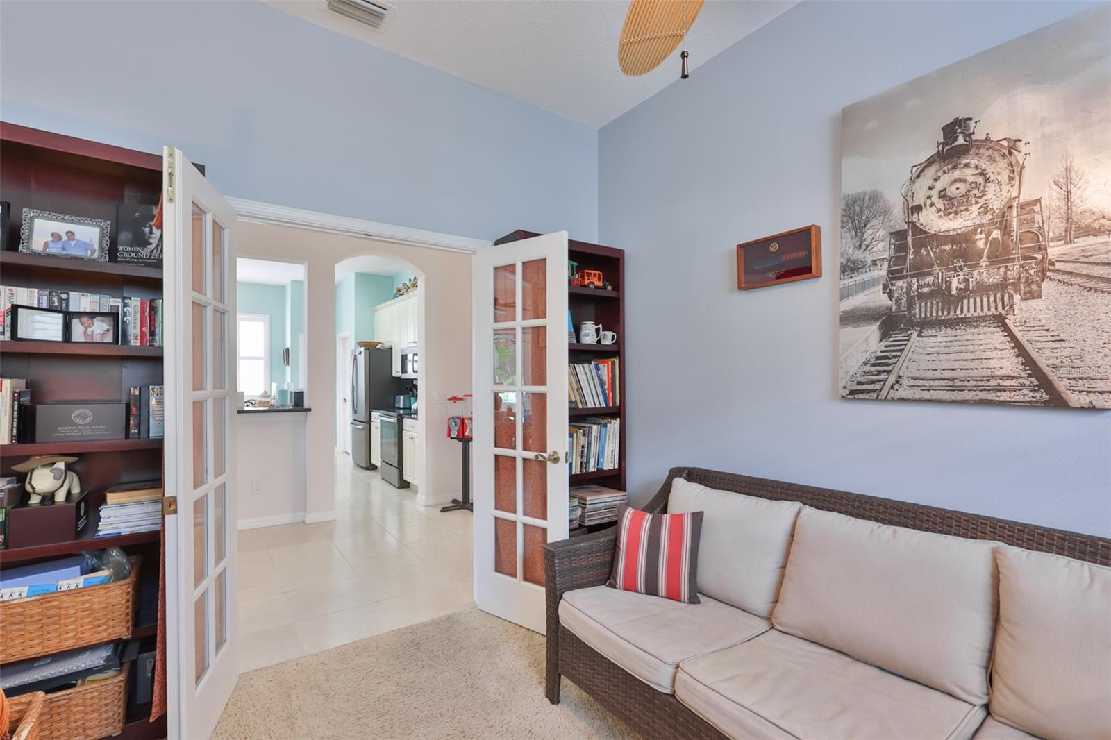 Glass paneled French doors accent the home with easy access to the rest of the home.