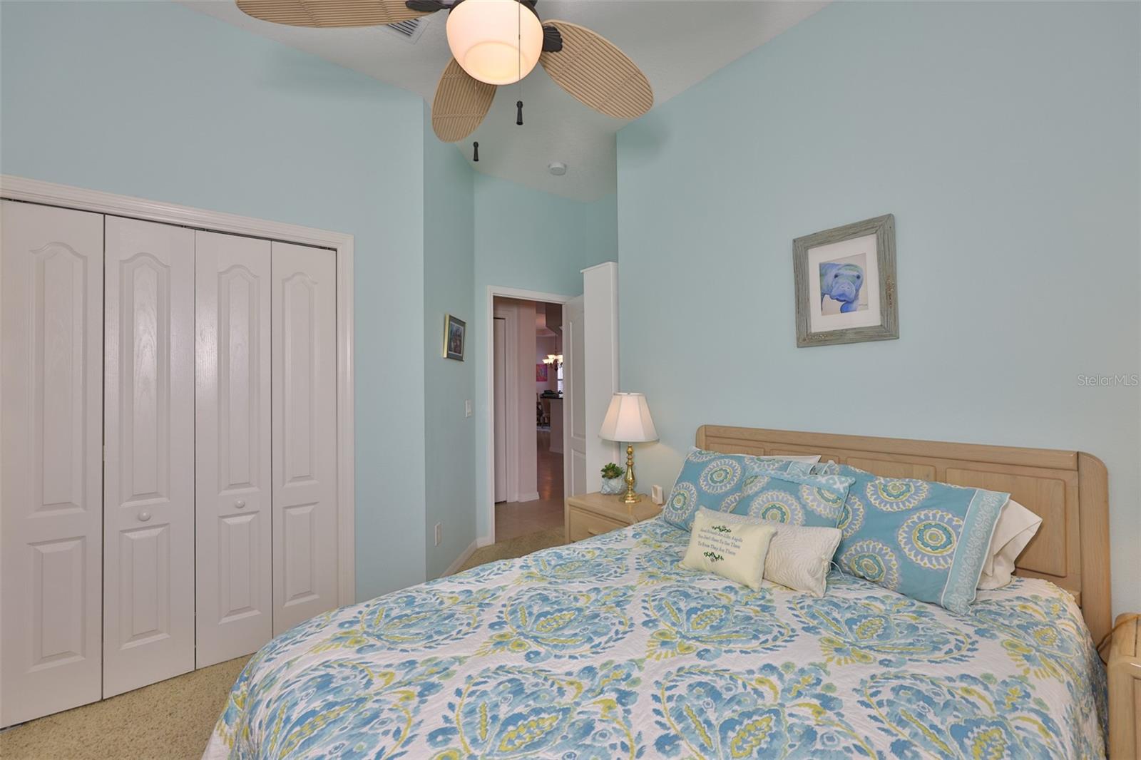 Bedroom #3 has a large wall closet and soft neutral tones for a relaxing and enjoyable stay.