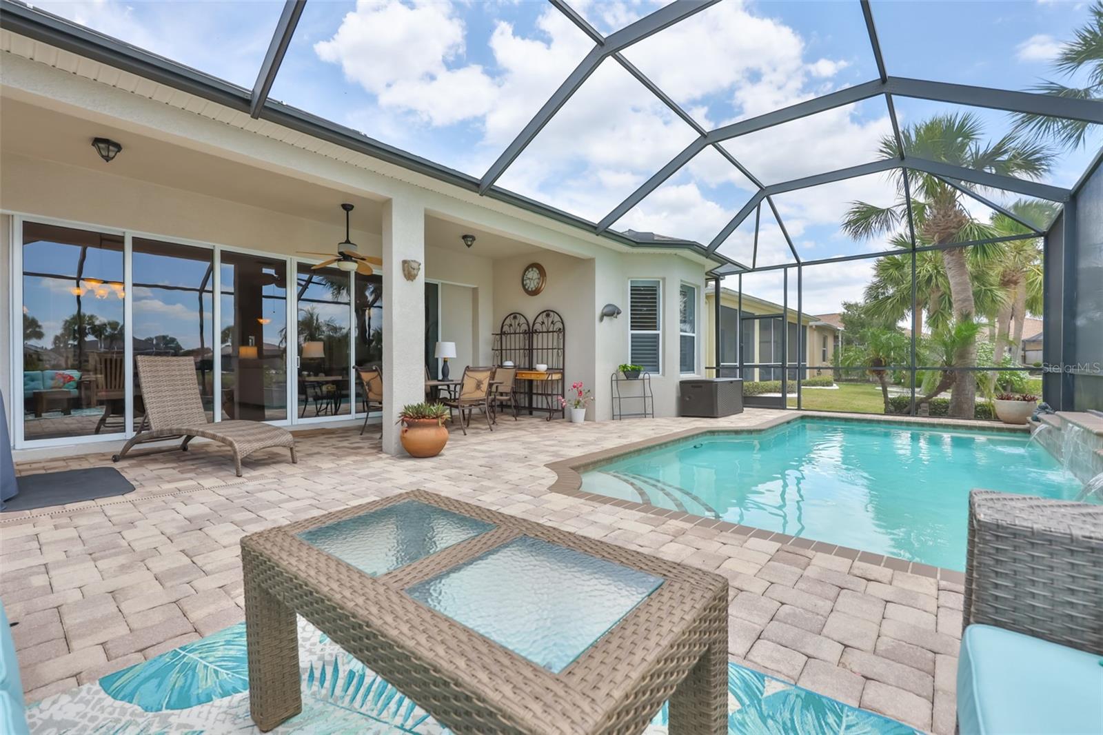 A large beautifully kept deck with six (6) telescoping sliding glass doors that open up the entire space.