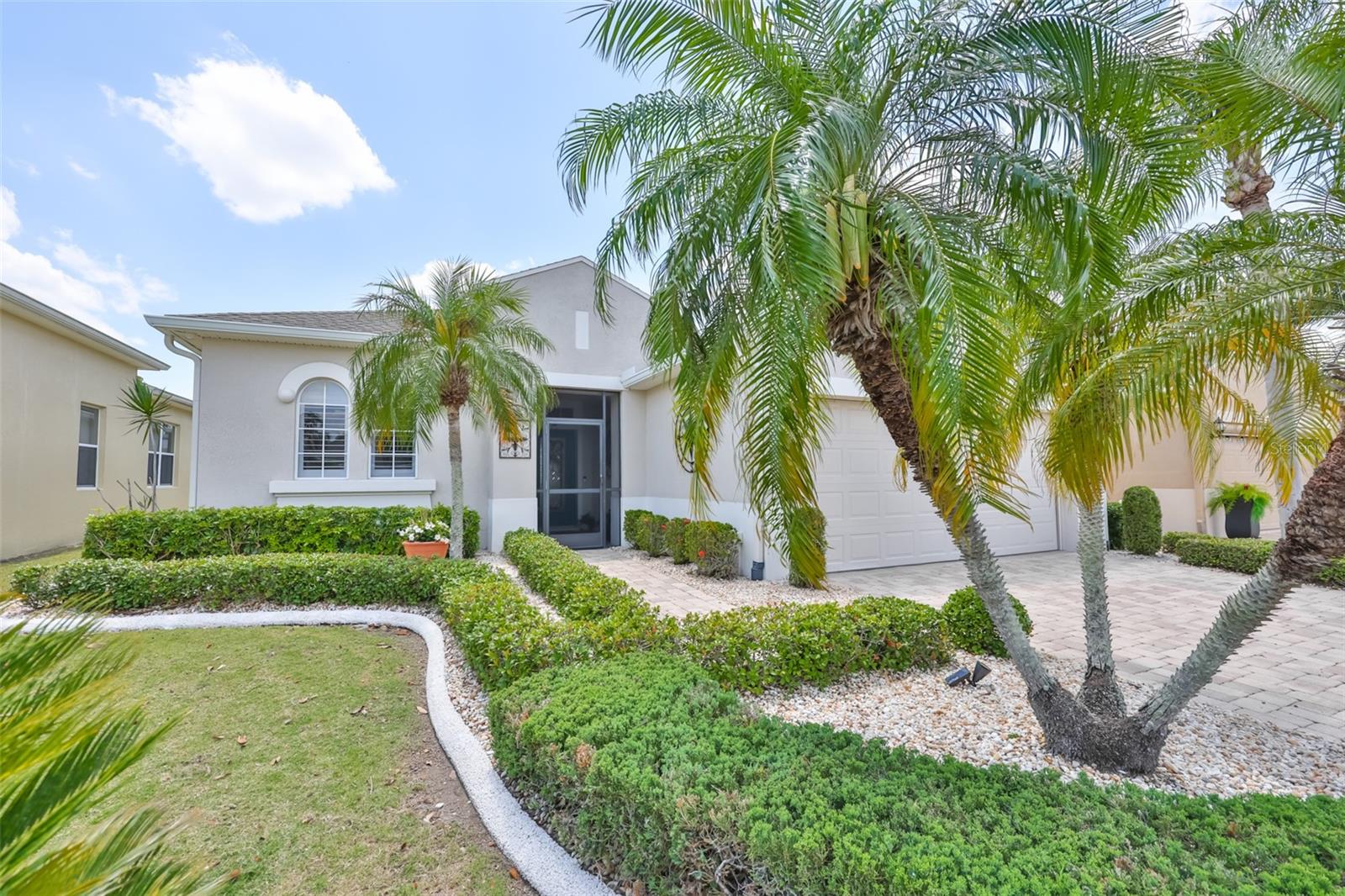 Manicured exterior, lights and low maintenance.