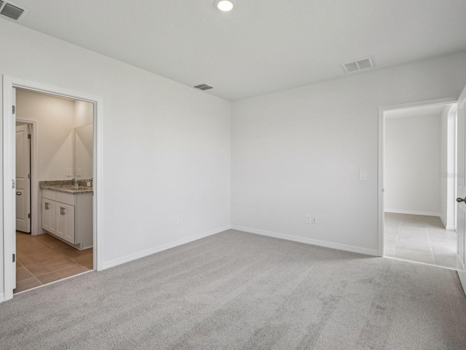 Interior photos are not of the actual home but are photos of the builder home with the same floorplan with similar interior finishes and features.