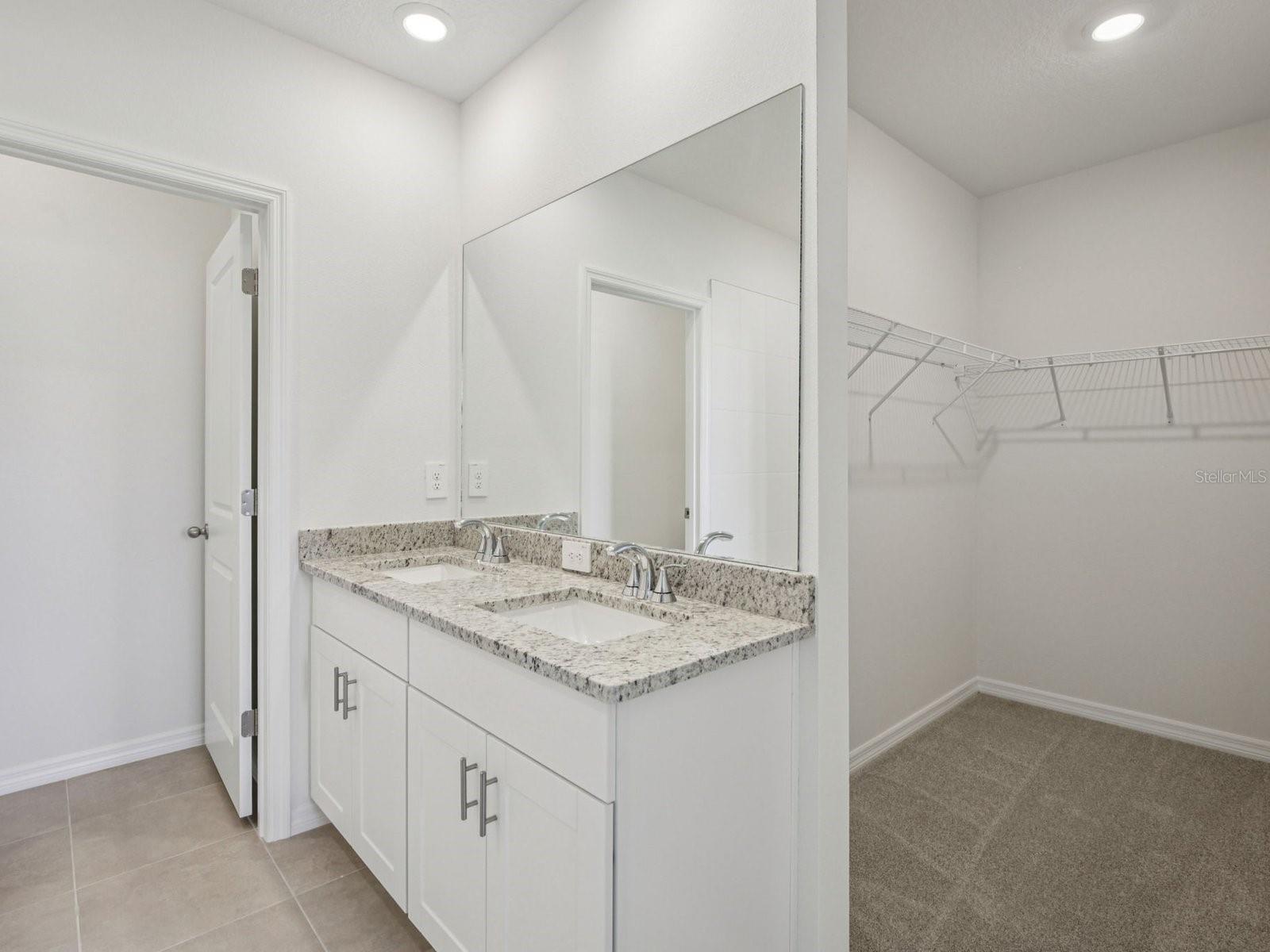 Interior photos are not of the actual home but are photos of the builder home with the same floorplan with similar interior finishes and features.