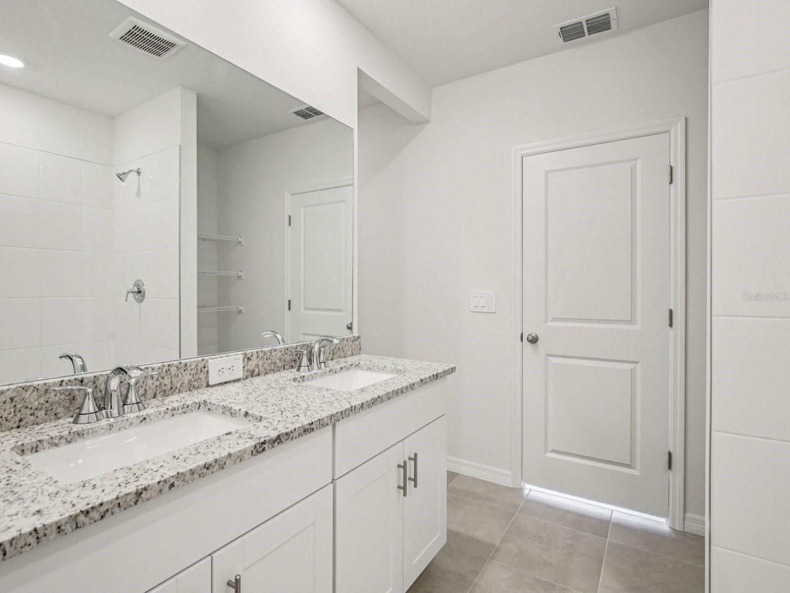 Interior photos are not of the actual home but are photos of the builder home with the same floorplan with similar interior finishes and features.