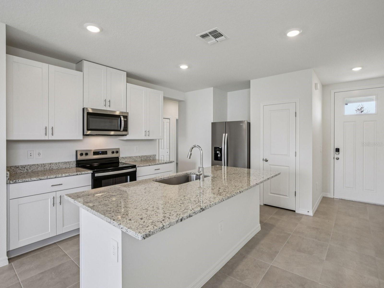 Interior photos are not of the actual home but are photos of the builder home with the same floorplan with similar interior finishes and features.