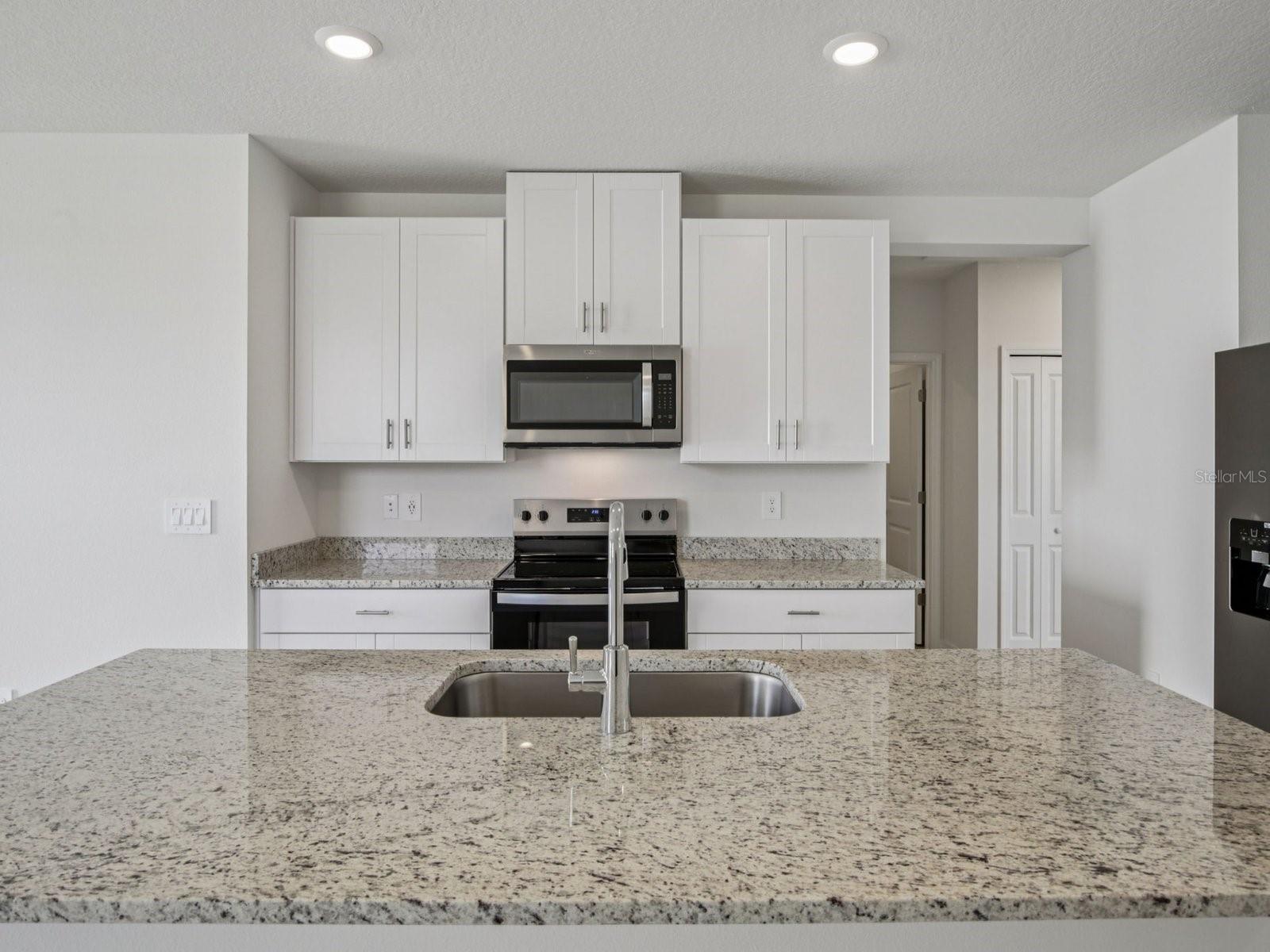 Interior photos are not of the actual home but are photos of the builder home with the same floorplan with similar interior finishes and features.