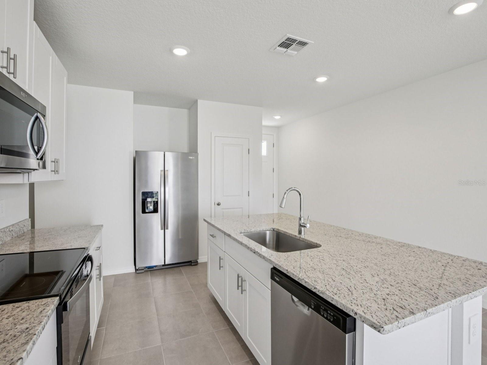 Interior photos are not of the actual home but are photos of the builder home with the same floorplan with similar interior finishes and features.