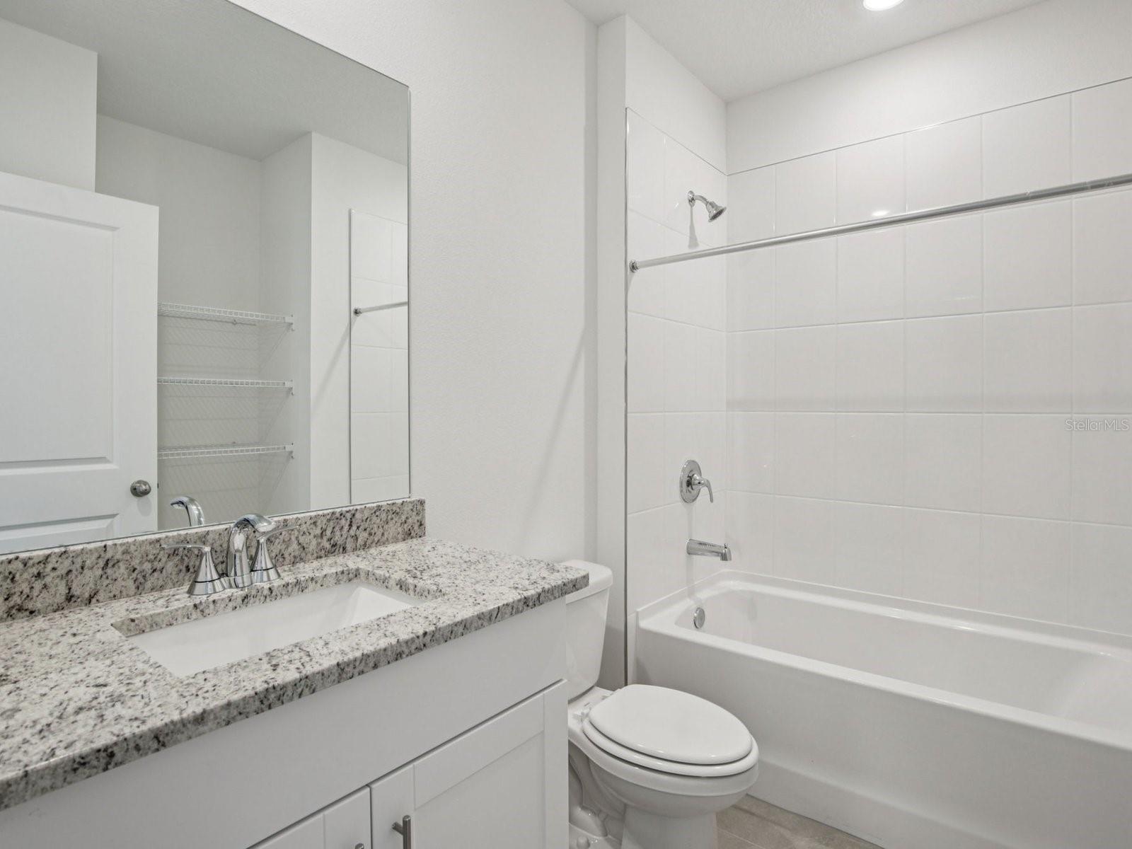 Interior photos are not of the actual home but are photos of the builder home with the same floorplan with similar interior finishes and features.