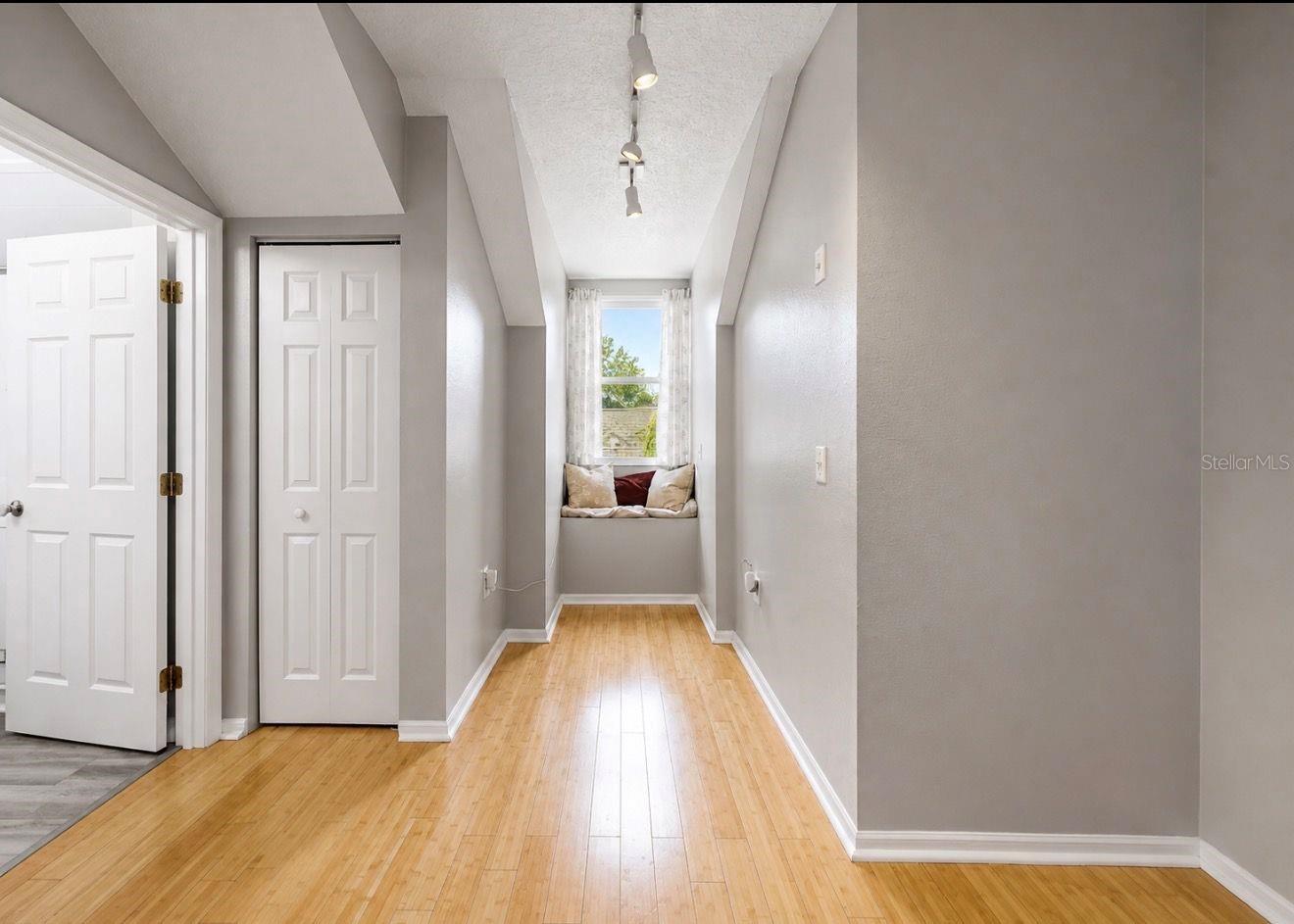 Upstairs hallway. Super cute reading nook.