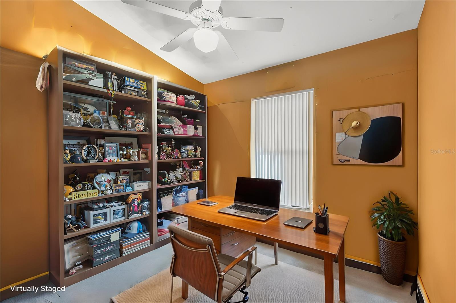 All secondary bedrooms are carpeted with ceiling fans and built-in closets.