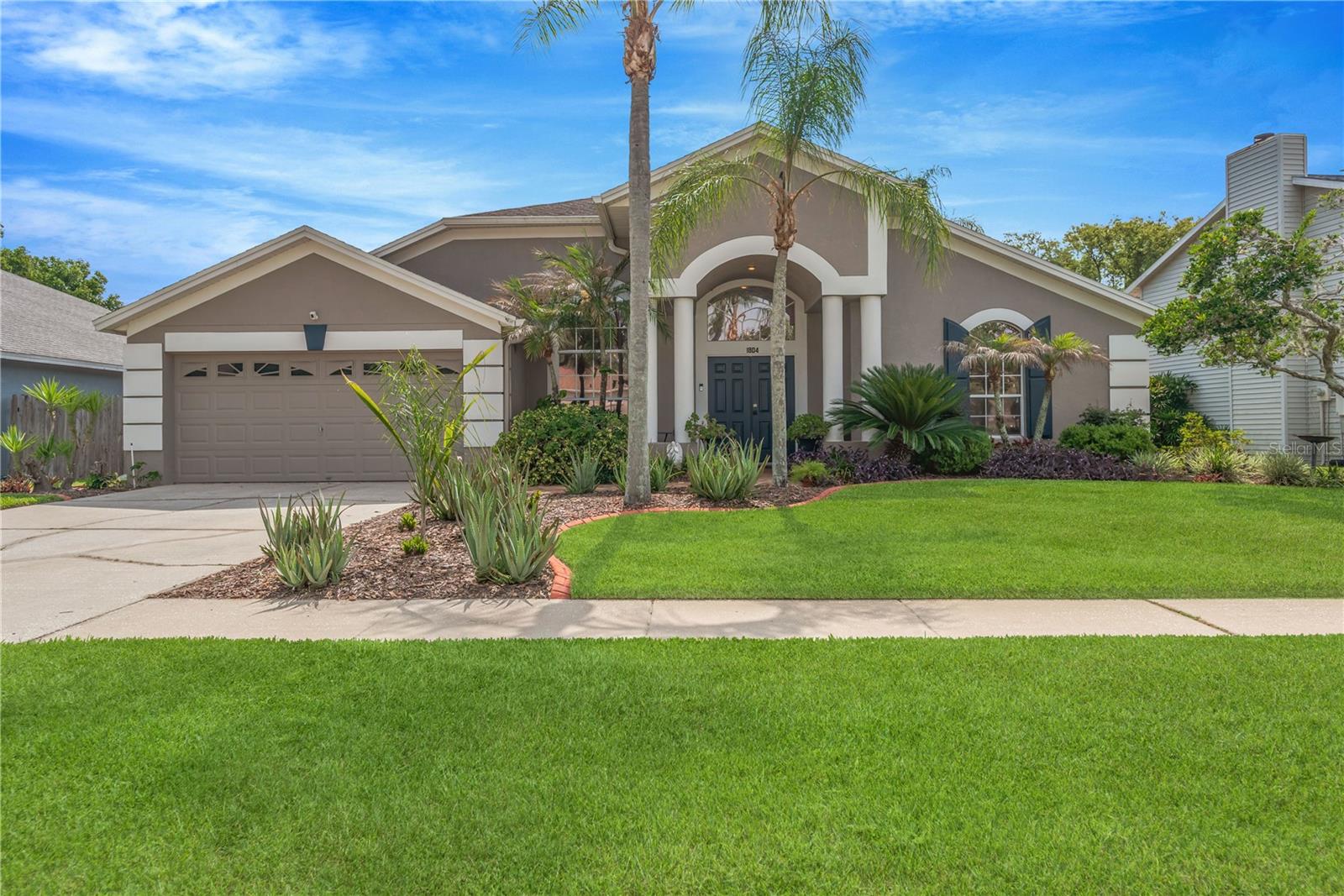 Additional features include Plantation Shutters throughout, tinted west facing windows, decorative landscape curbing, and extensive kitchen & bathroom updates completed by the original owner for peace of mind, including: Upgraded A/C, Pool Skimmer, and fresh new sod (2025)  Exterior paint (2024)  Updated roof (2015)  Renovated kitchen and all 3 bathrooms,  New electrical box,  Pool resurfacing and lanai pavers (2010) Re-piped original butylene pipes for added peace of mind (2004).