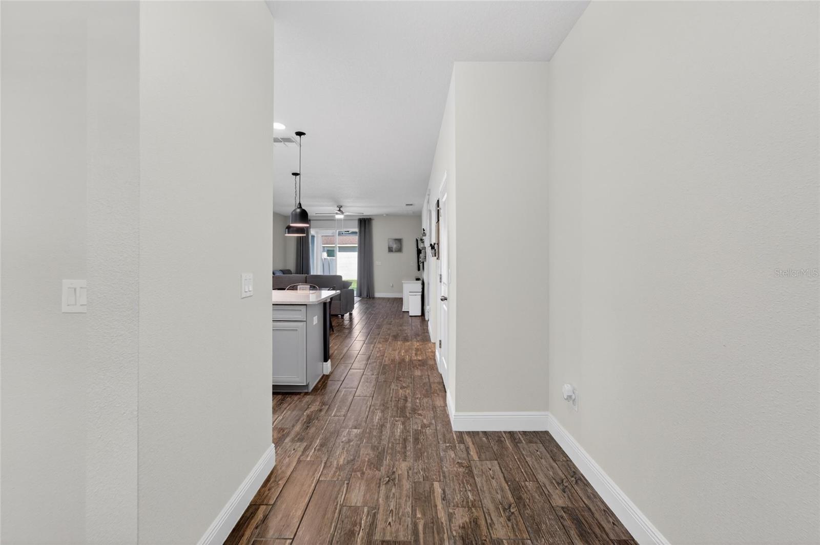 Bright entryway enhances the home’s open-concept design.