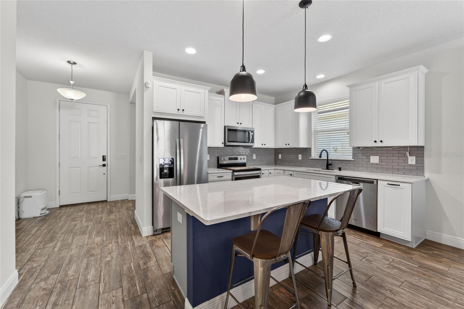 Spacious counters and ample storage make cooking a pleasure.