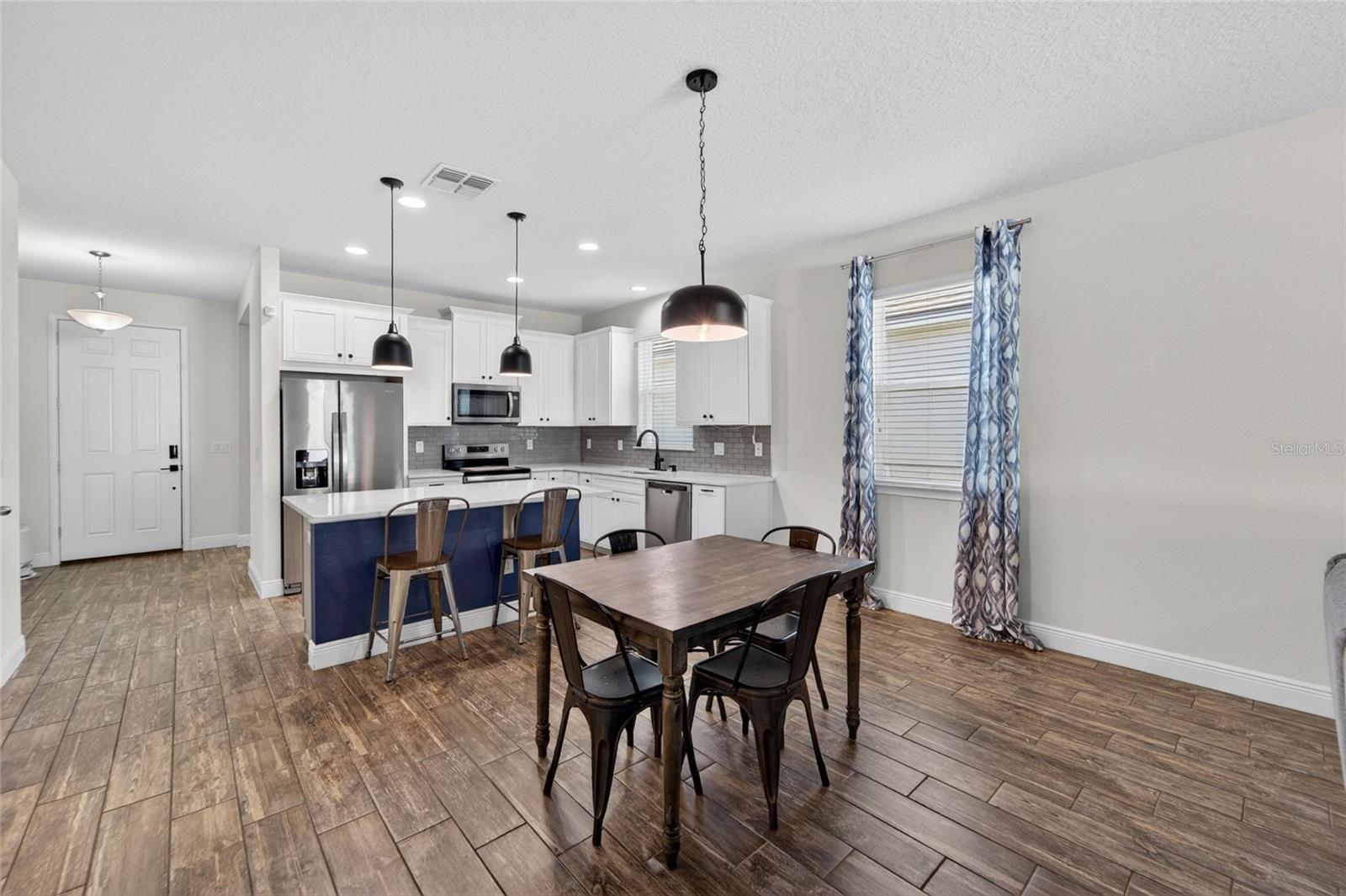 Kitchen and dining spaces designed to keep everyone connected.