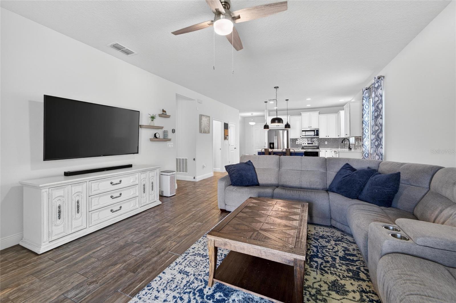 Large living area with excellent flow into the kitchen and dining spaces.