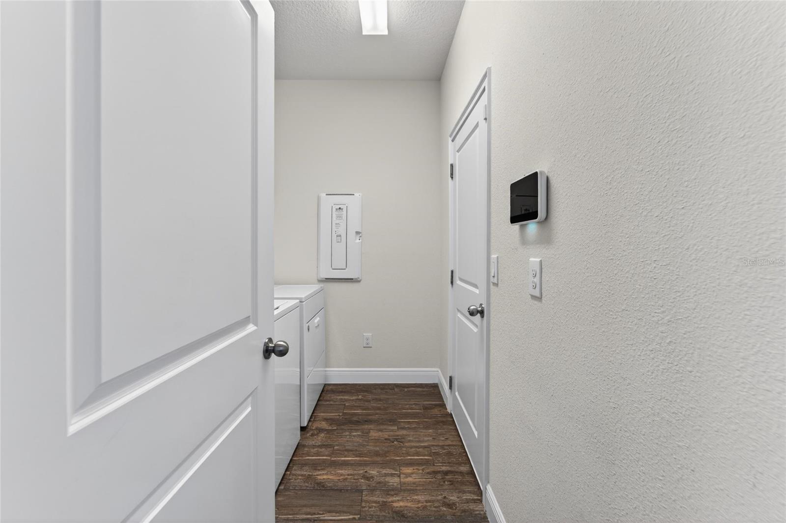 Dedicated laundry area adds comfort and convenience.