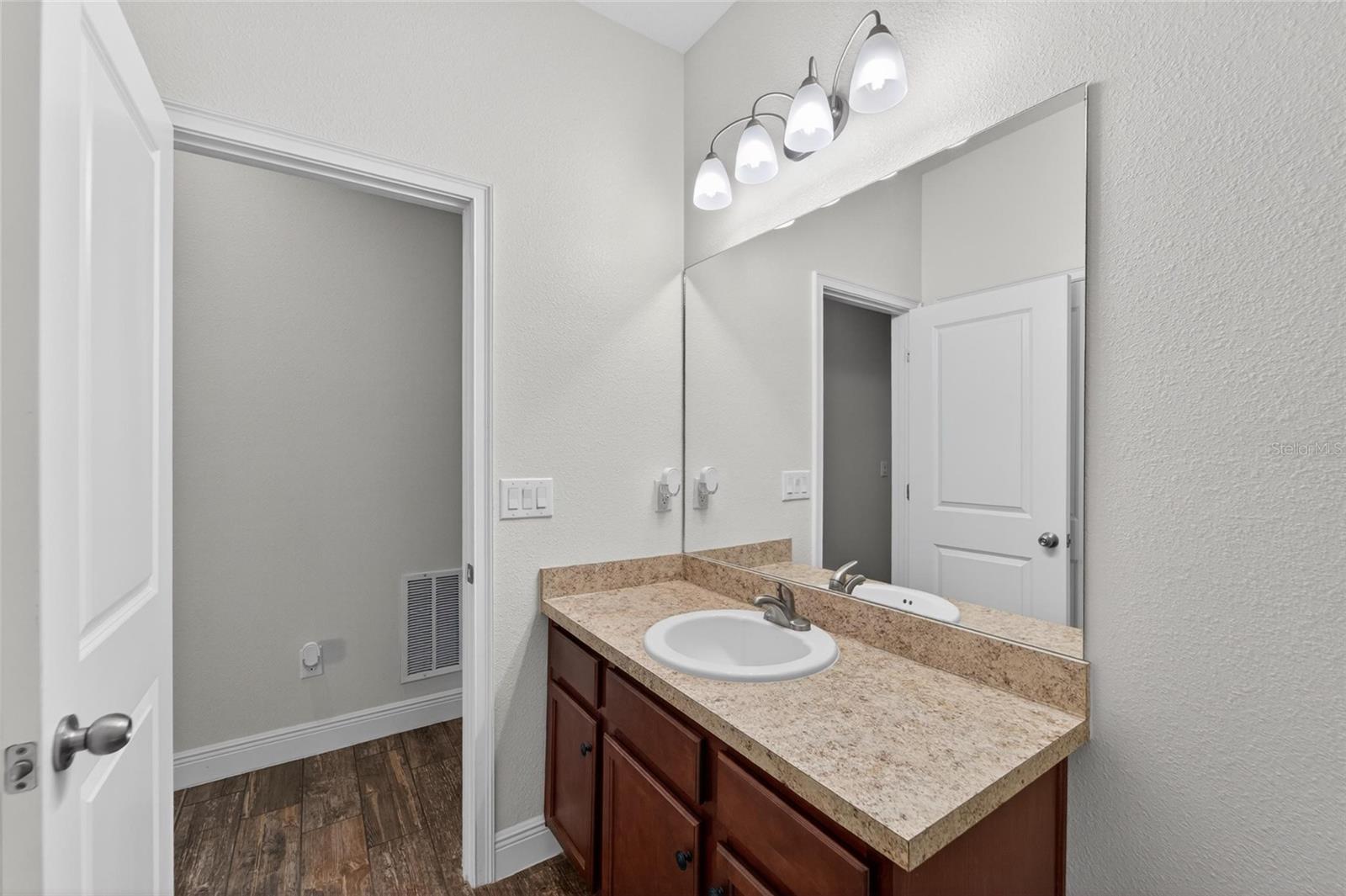 Bright and welcoming bathroom space for family and visitors alike.