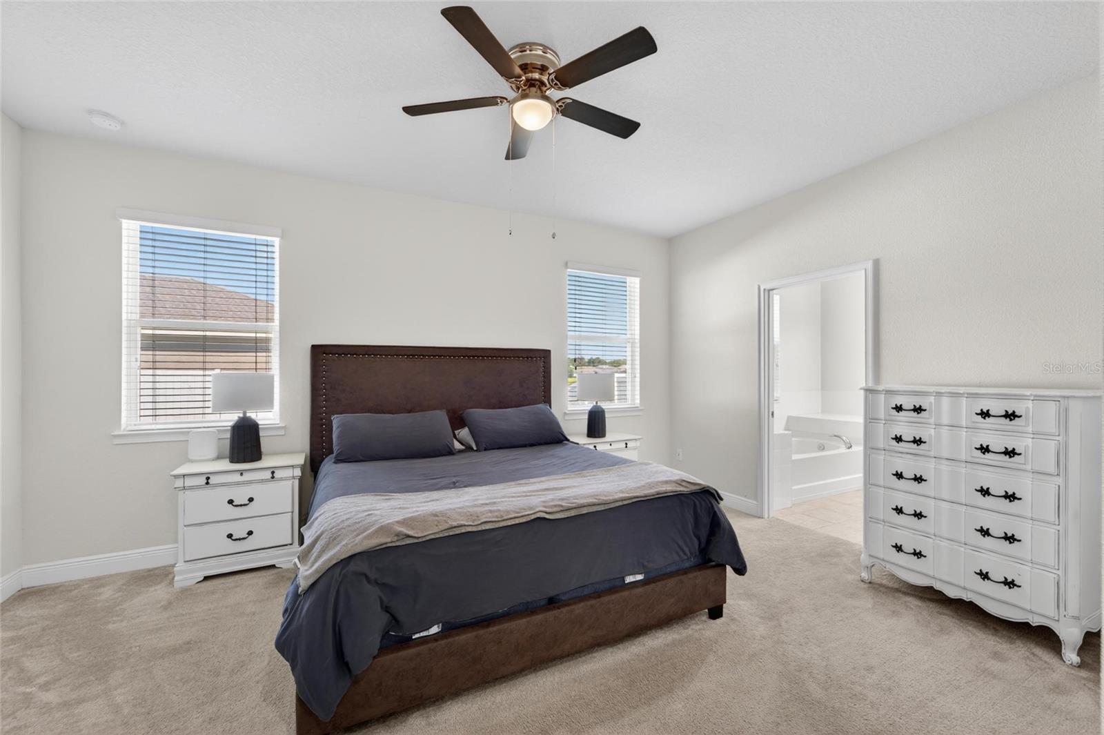 Relaxing primary suite designed as a private retreat.