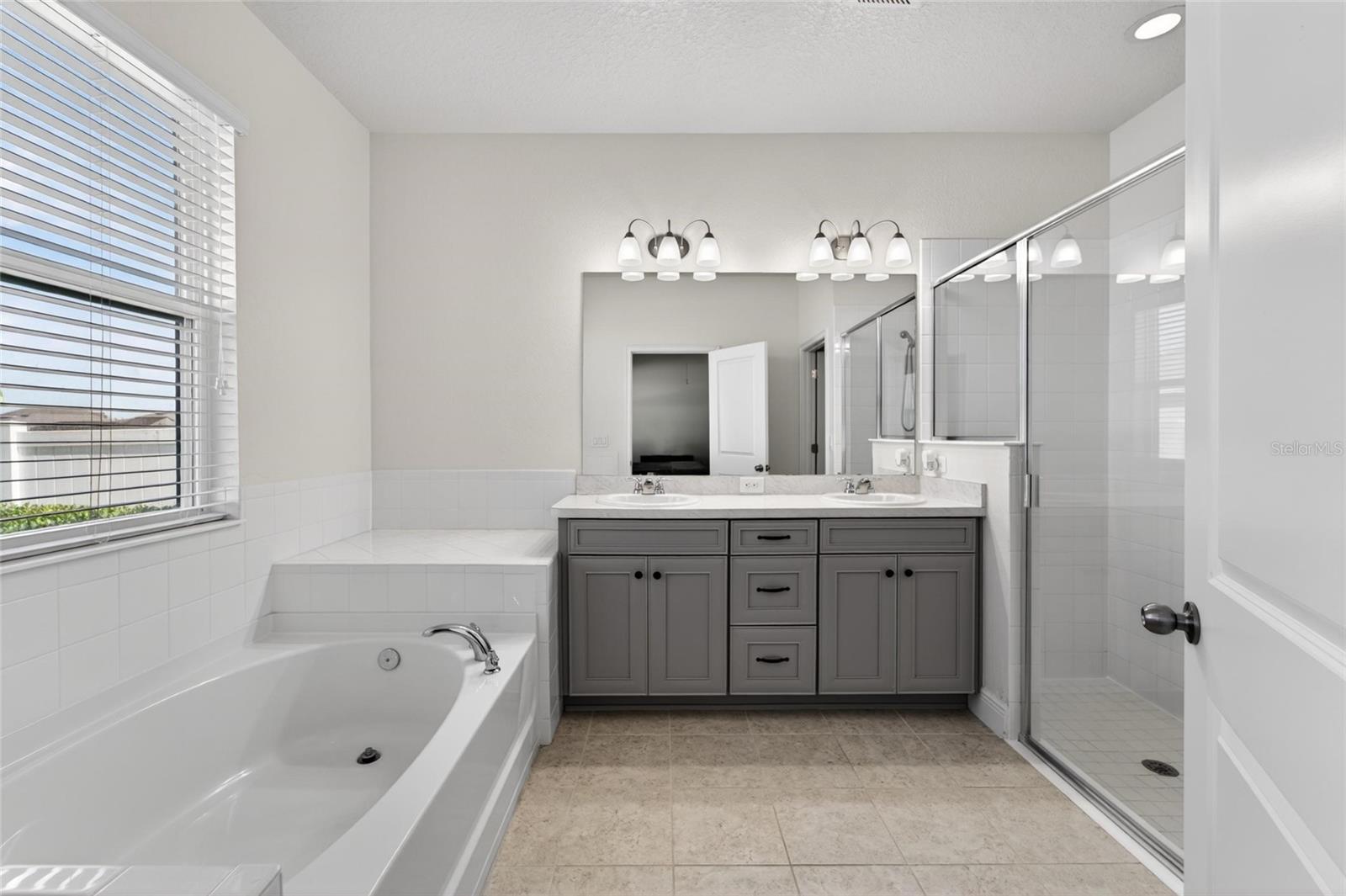 Private owner’s bath creates a peaceful retreat experience.
