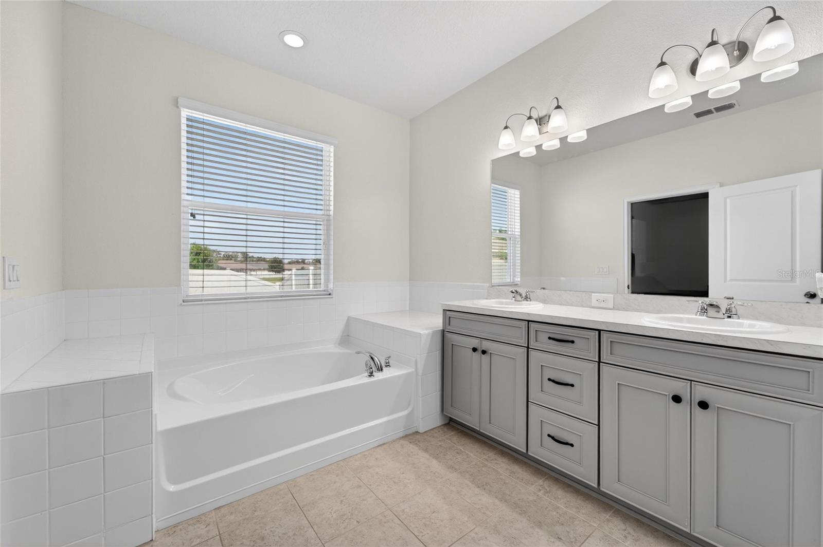 Spacious owner’s ensuite designed for convenience and comfort.