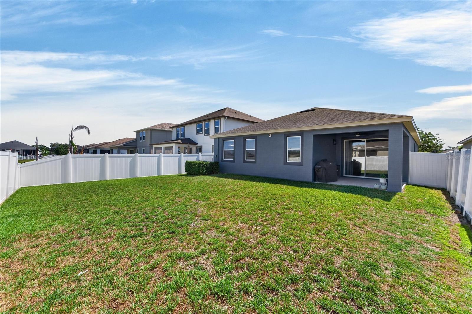 A spacious backyard designed for entertaining, pets, and everyday enjoyment.