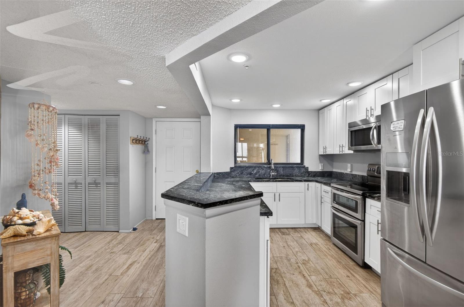 Kitchn with Stainless appliances, Double oven,soapstone counters