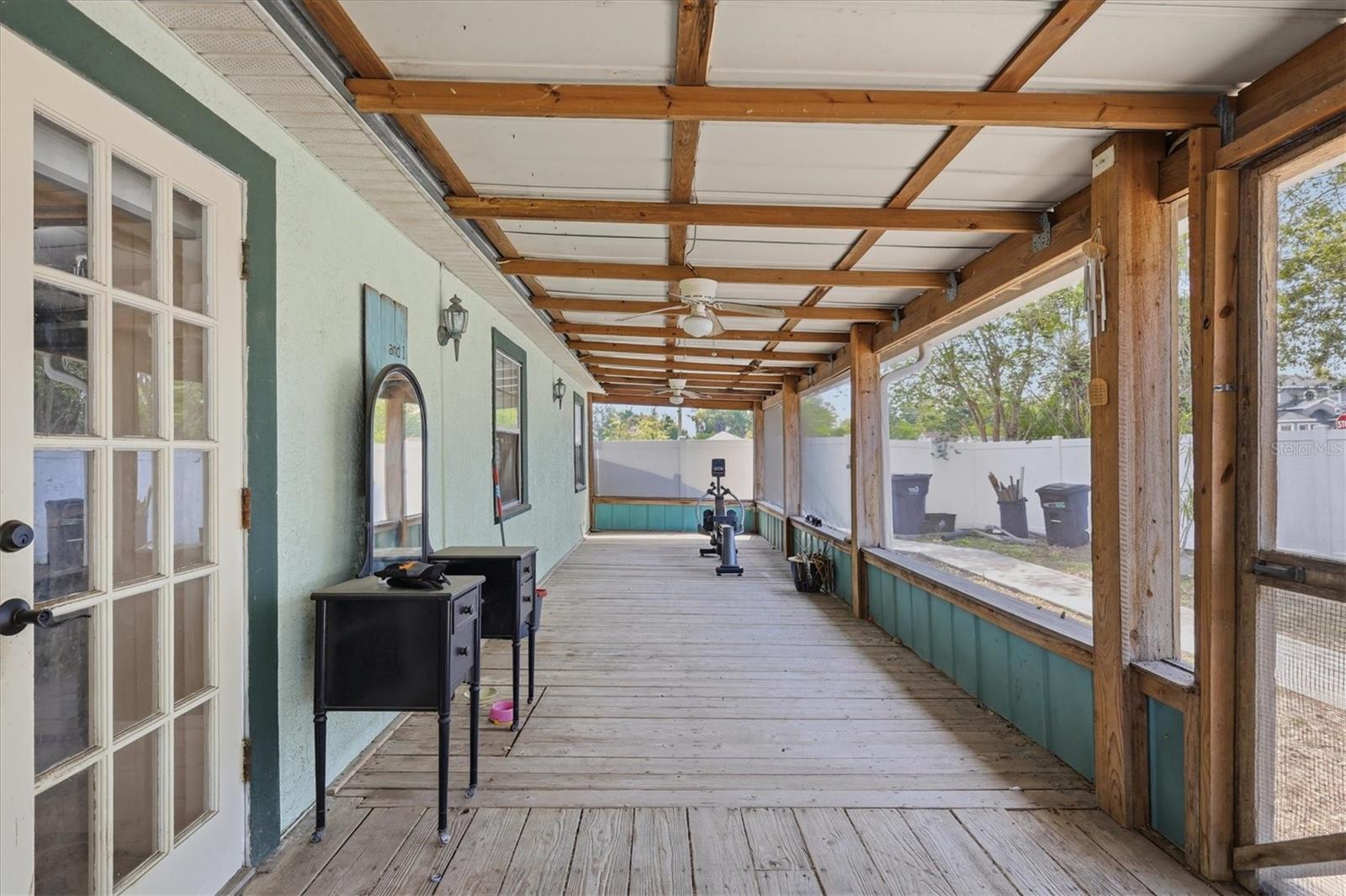 Covered screened-in side patio