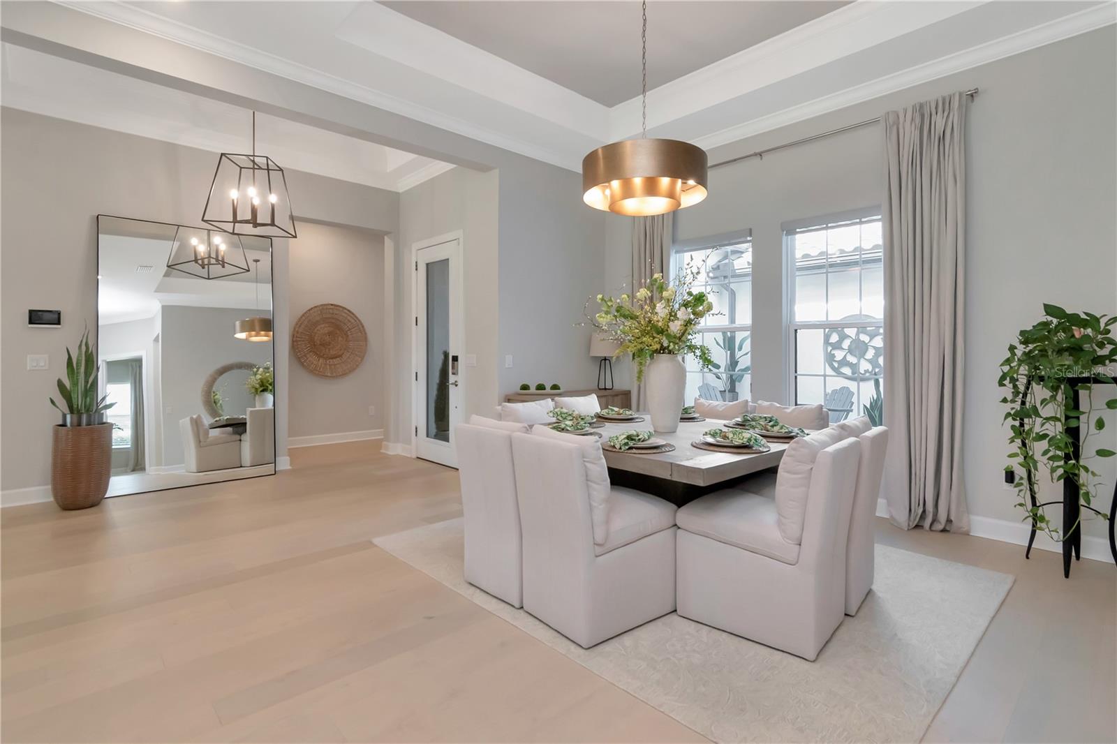 Formal Dining Space with elegant lightining.