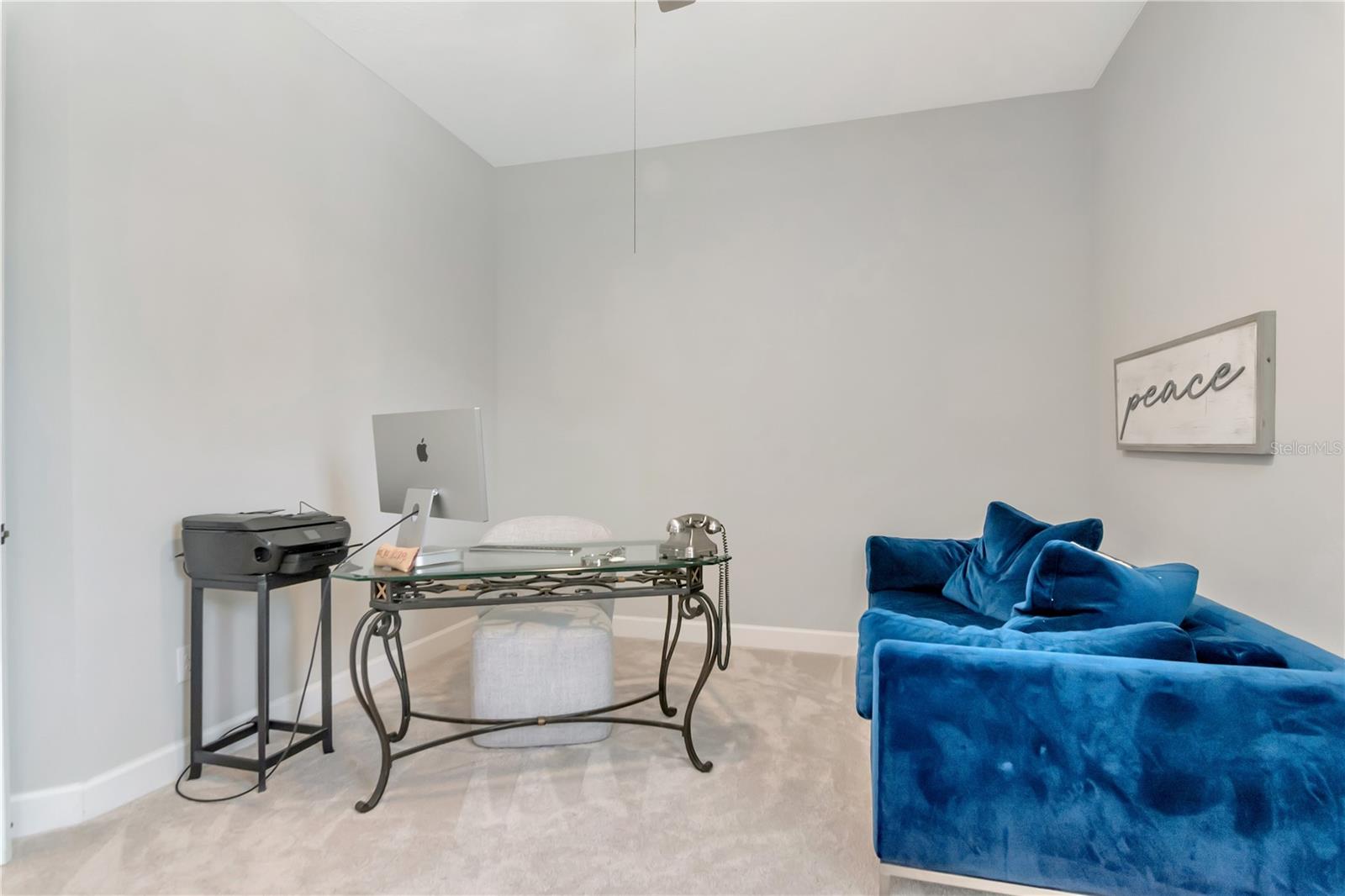 Bedroom 3 with shared Bathroom featuring private, dual vanities.