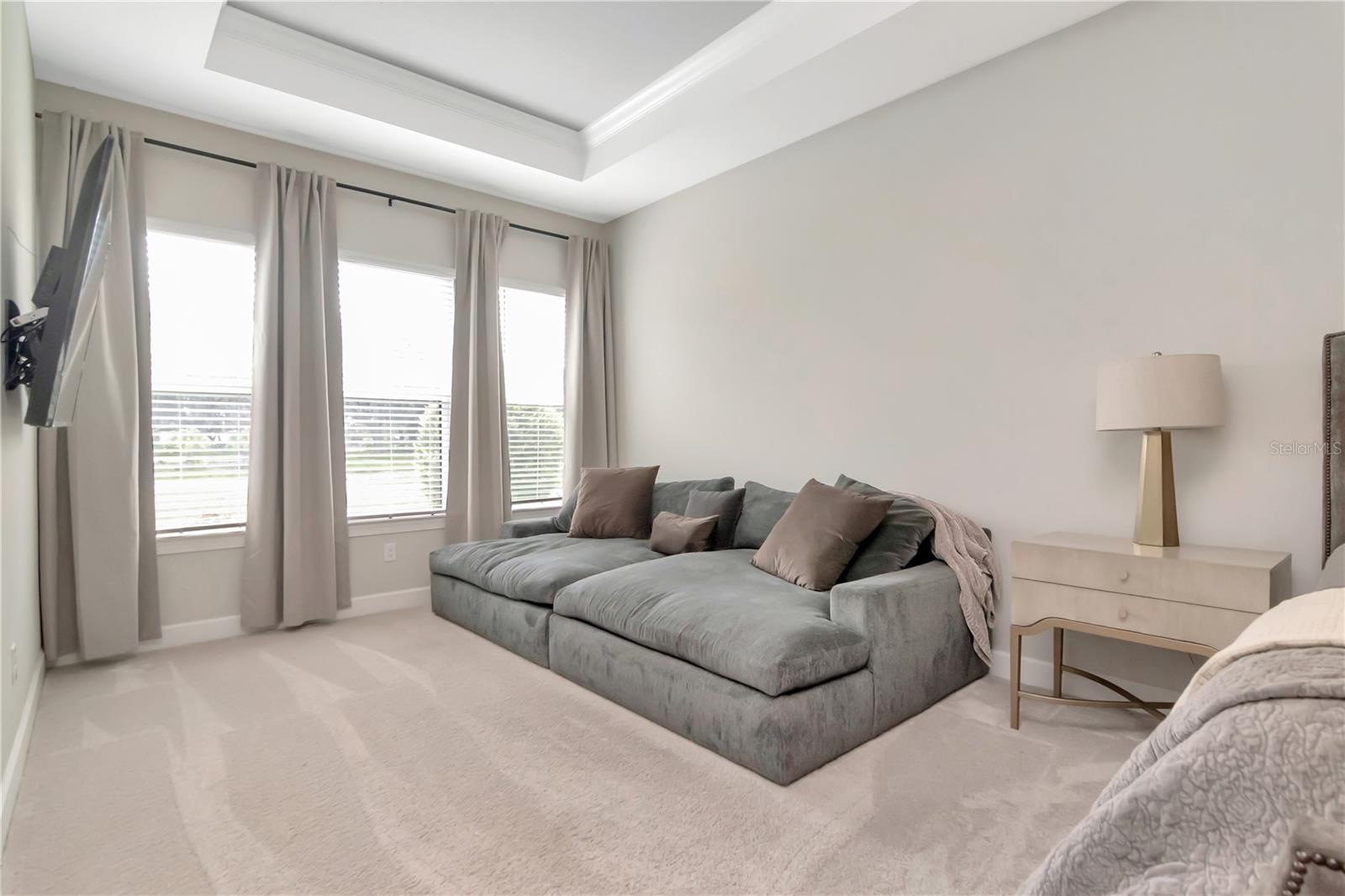 Primary Retreate with private "flex" space, lanai access, spa like ensuite and custom closet.